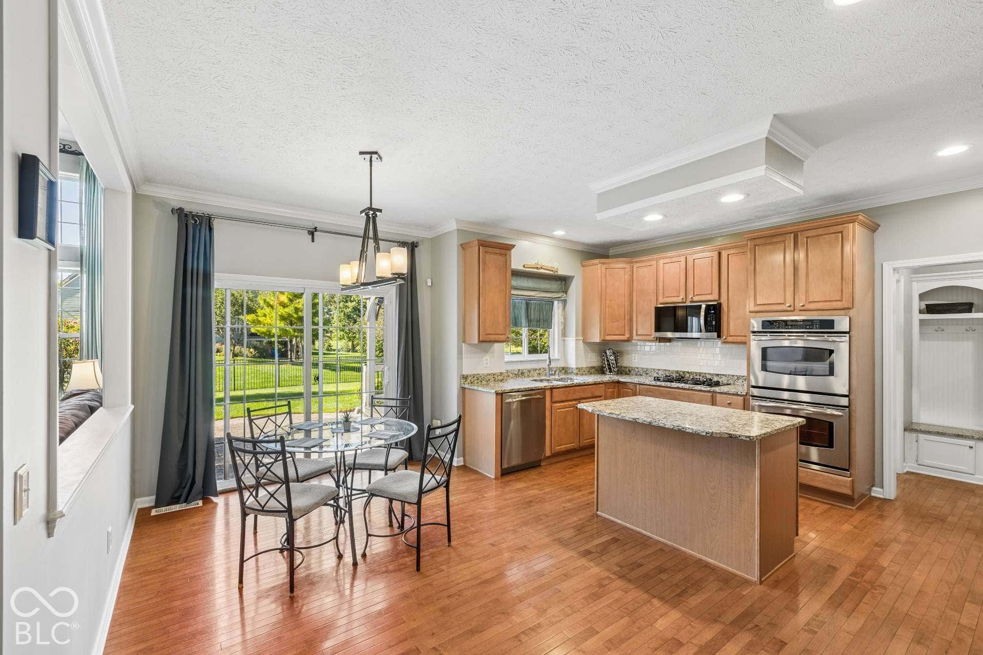 Open Kitchen & Breakfast Area. The kitchen and breakfast area flow together beautifully for everyday living and entertaining.