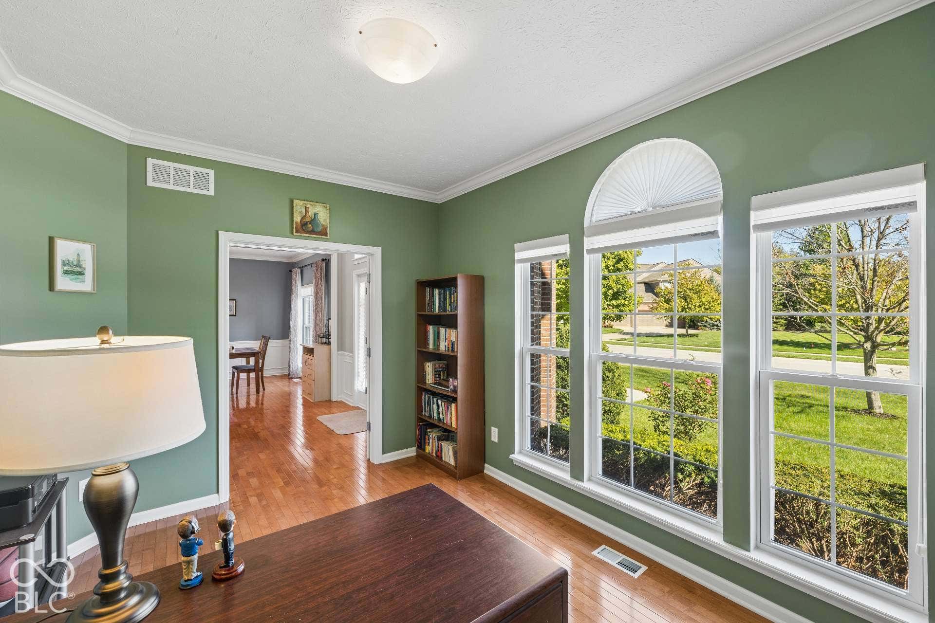 Main-Level Office. Large windows bring in natural light and views, creating an inviting place to work, read or study.
