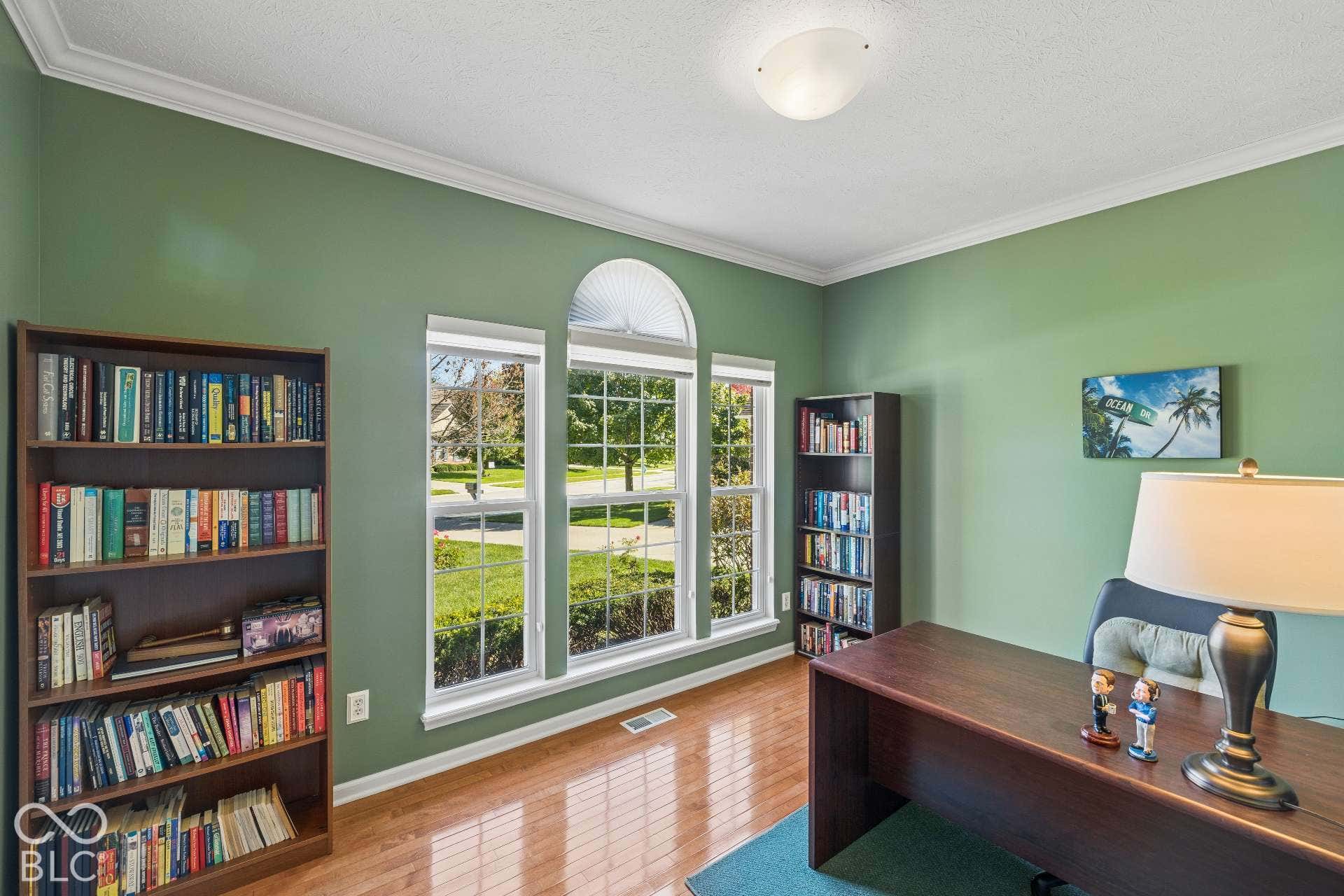 A dedicated main-level office provides a quiet place to work from home with beautiful natural light.
