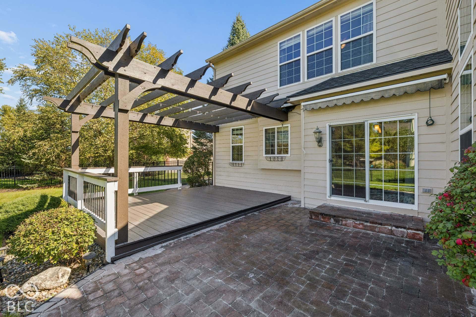 Outdoor Living. Paver patio and pergola create an inviting outdoor space for dining, entertaining or simply relaxing.
