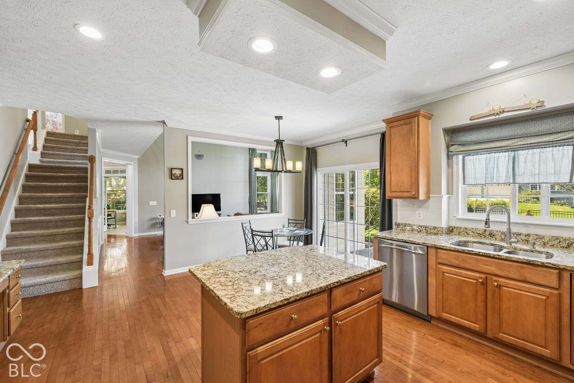 Kitchen Island. The center island adds valuable prep space and creates a natural gathering spot in the heart of the home.