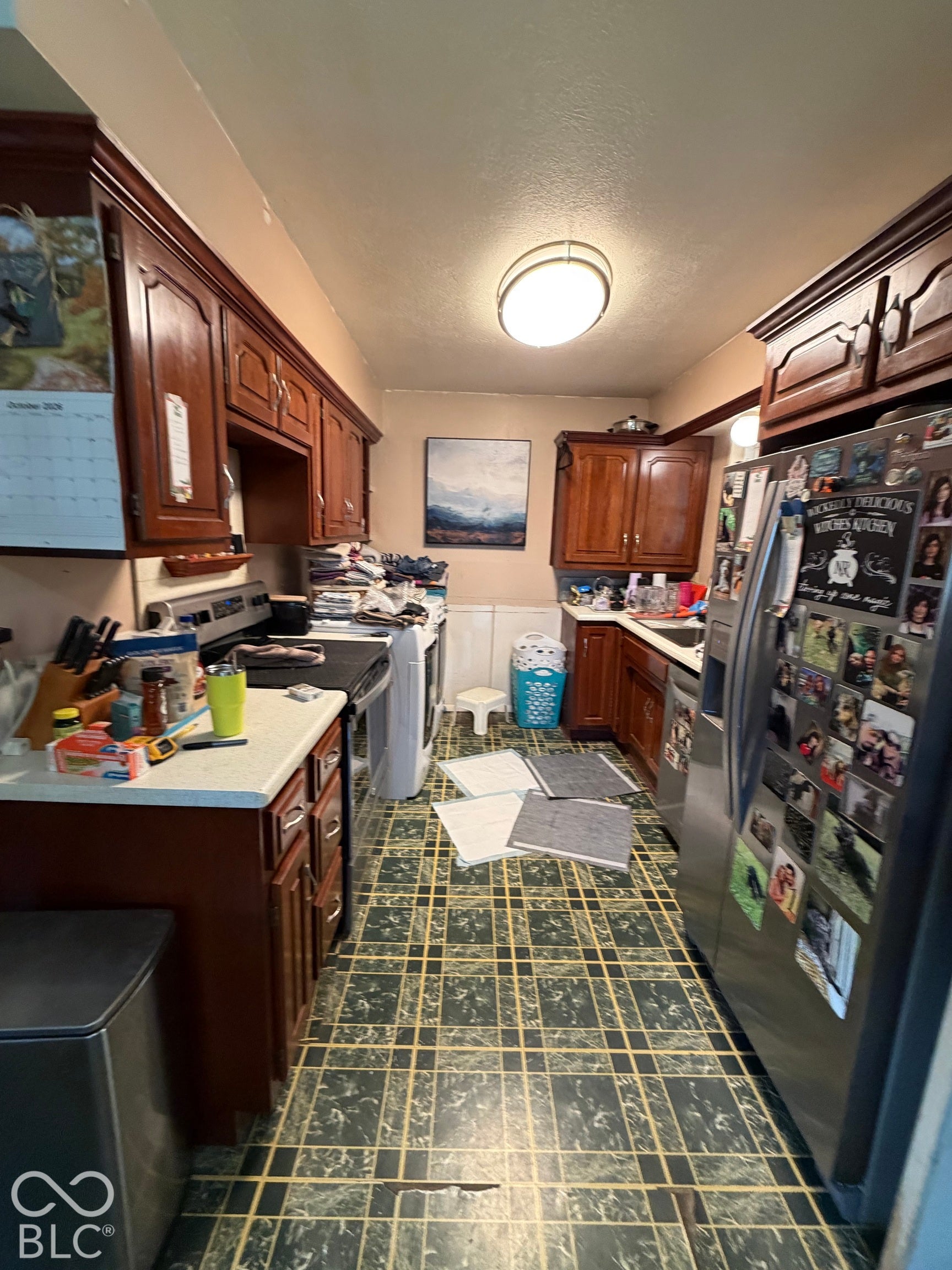 Wood-finish cabinetry paired with light-toned countertops
