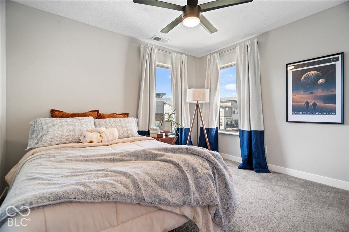 Recessed lighting, ceiling fan, and corner windows