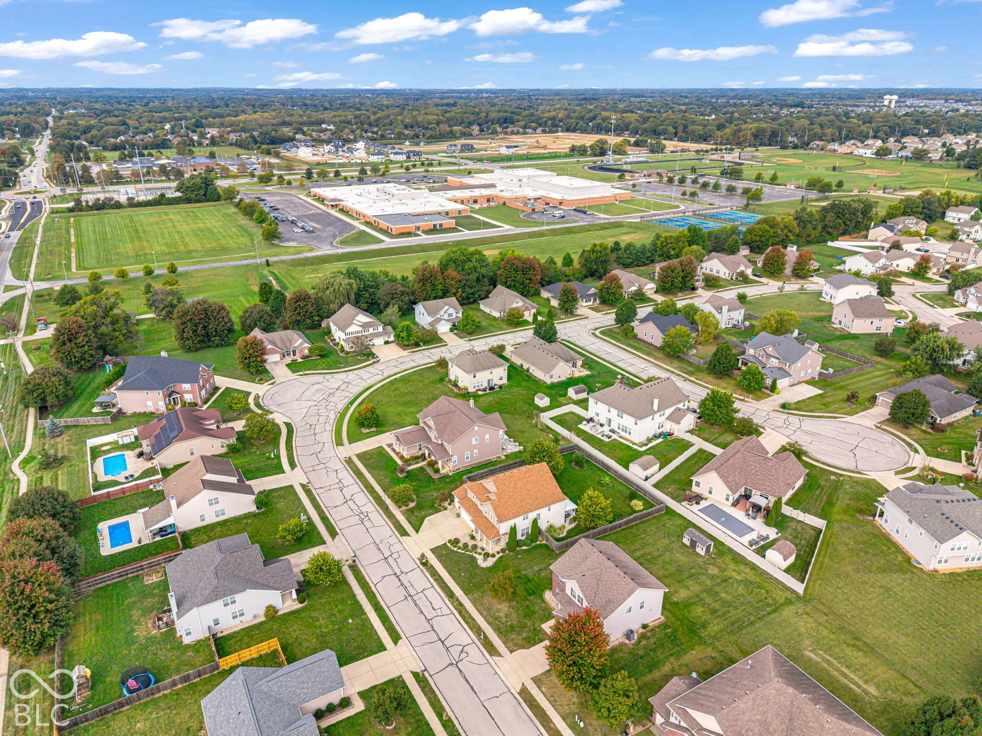Residential neighborhood with mature trees and a curvilinear street layout