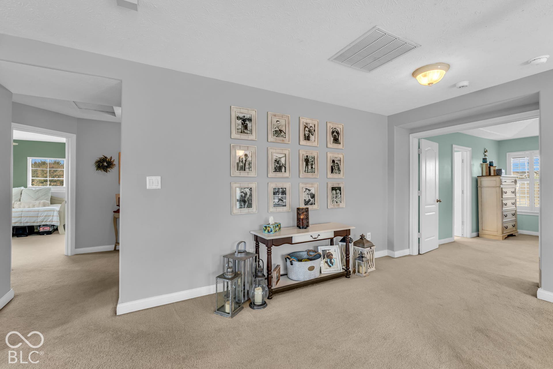 Neutral wall tones with carpet flooring