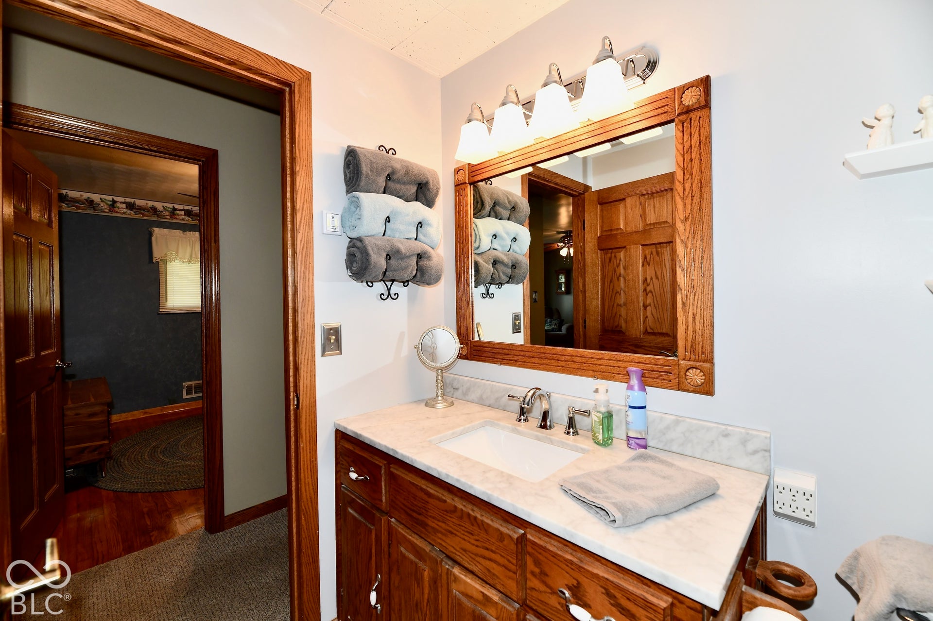 Bathroom updated and remodeled in 2022 with granite countertops, shower surround, paint, and new high rise toilet.