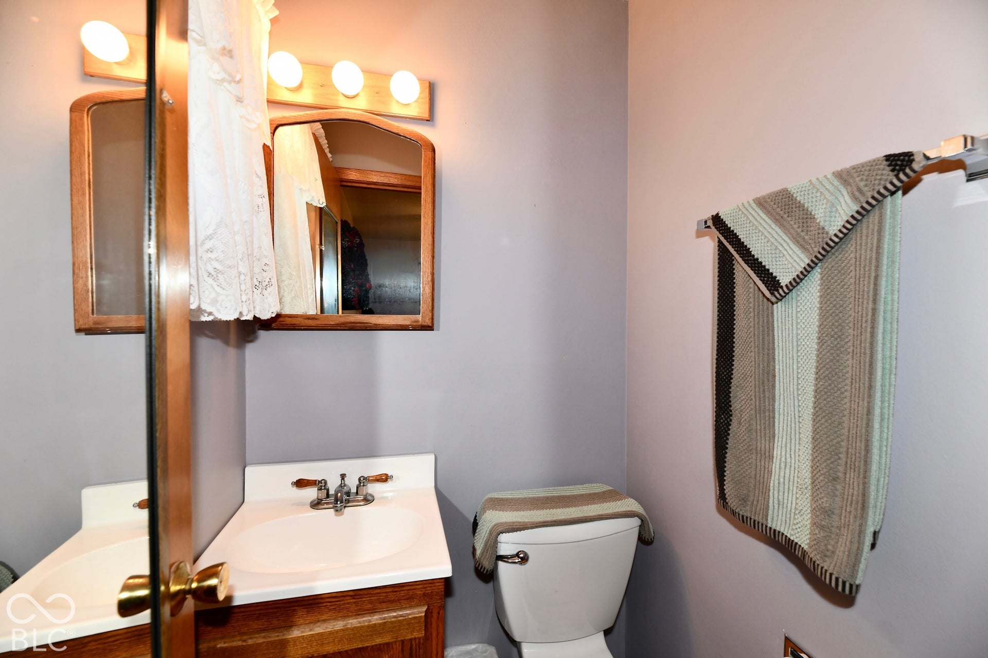 1/2 Bath attached to Bedroom 4 and updated in 2022.
