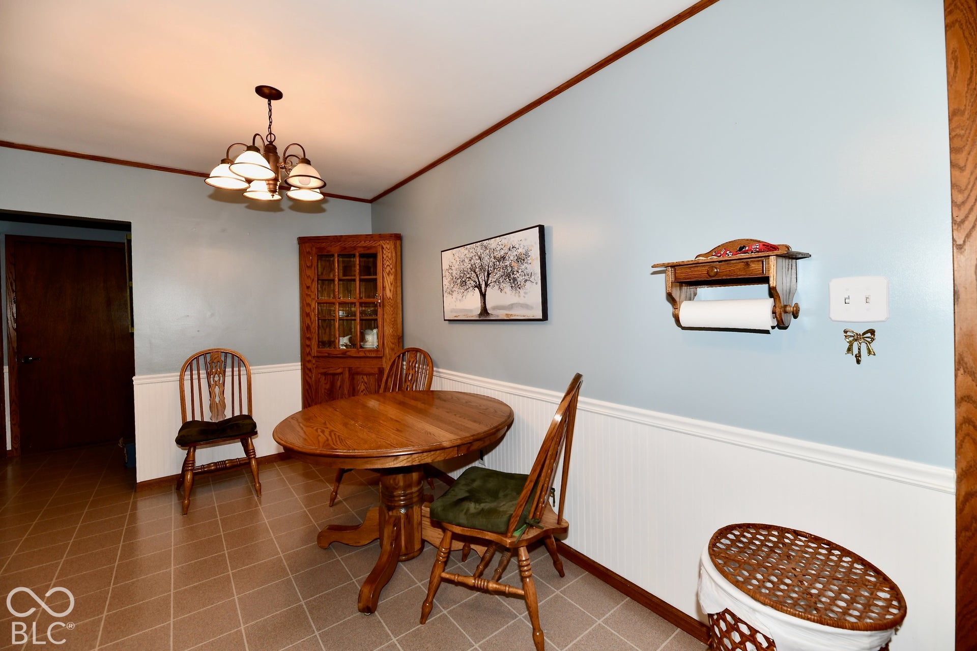 Eat In Kitchen with vinyl flooring and custom corner cabinet