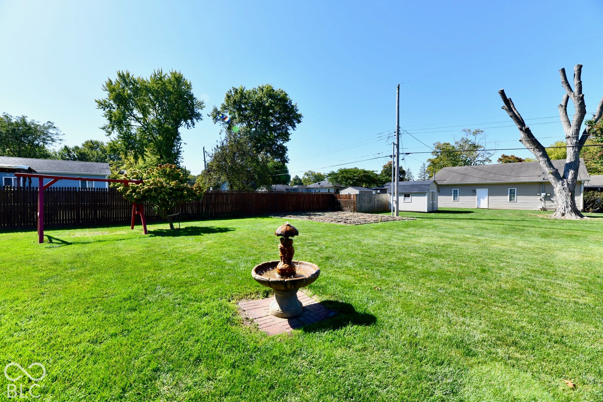 Spacious and well maintained yard with an established garden.