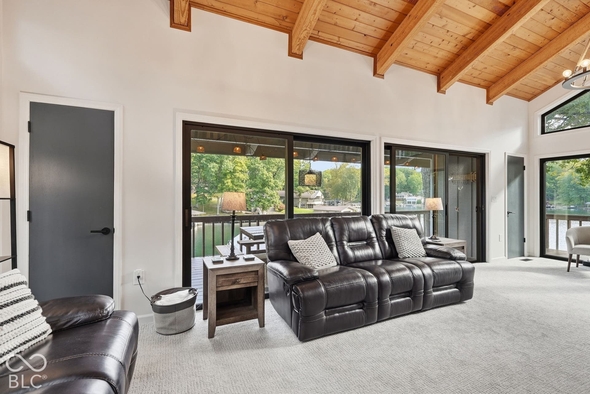 Vaulted wood-paneled ceiling with exposed beams