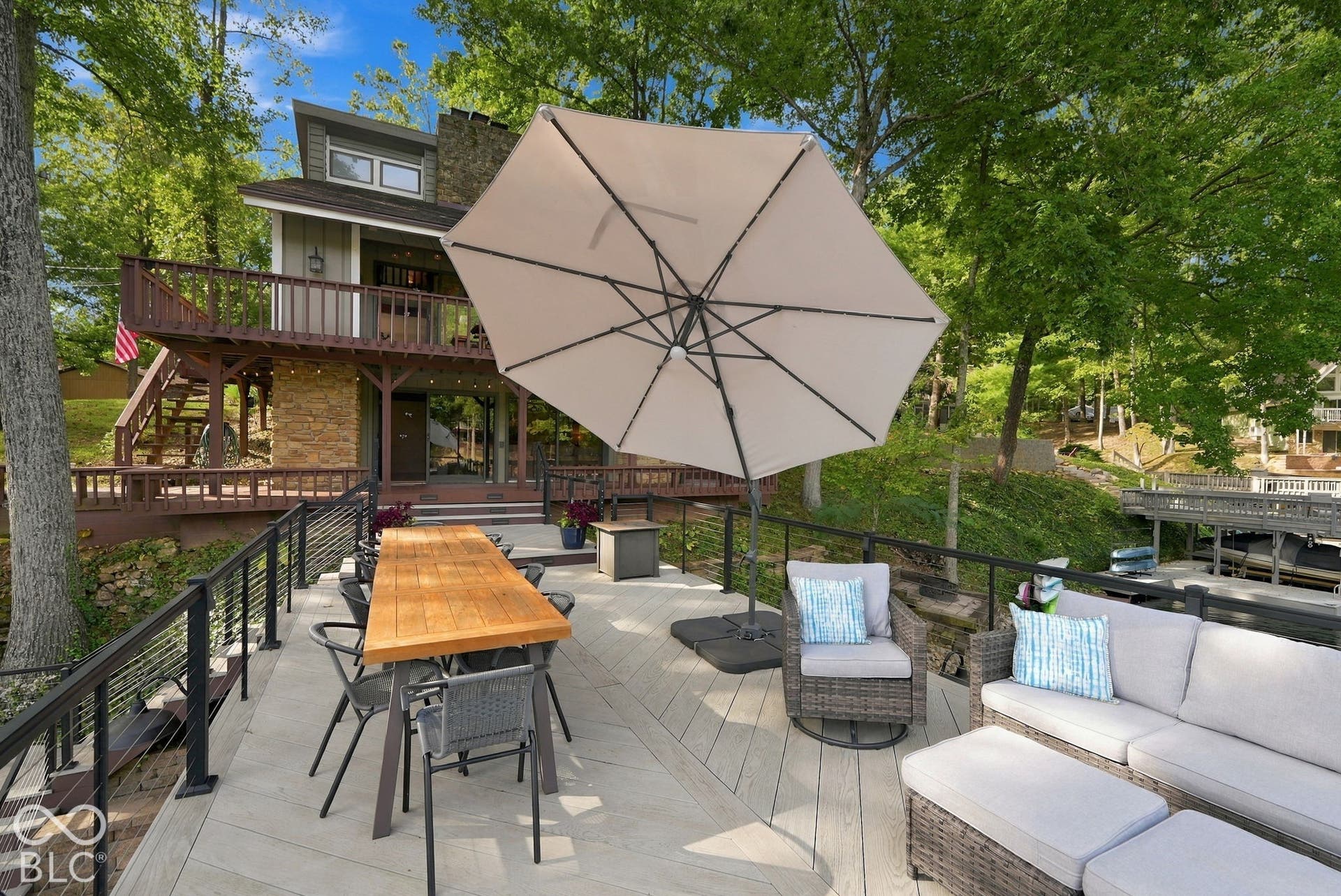 Multi-level deck with cable railing and expansive outdoor entertaining space