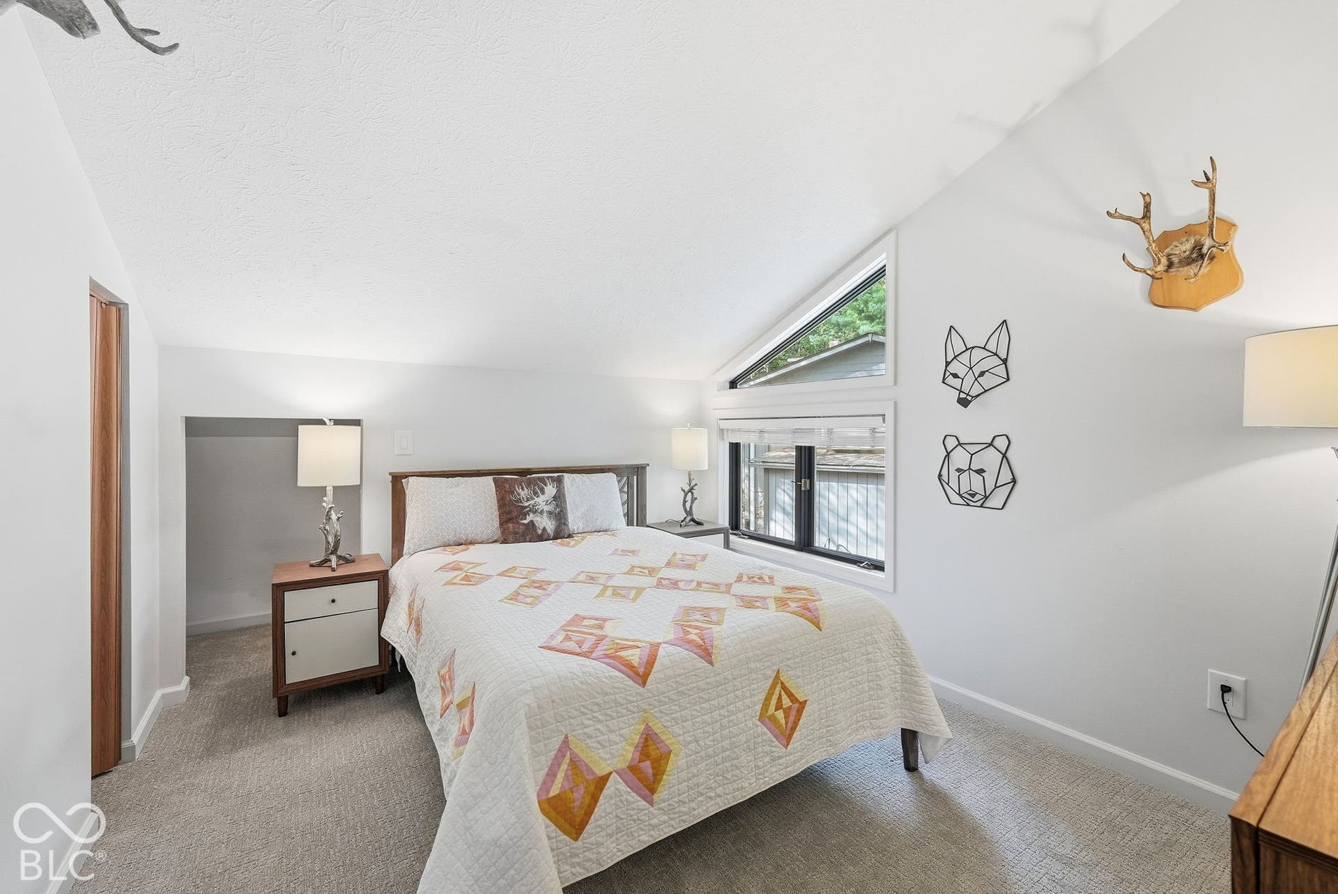 Vaulted ceiling with a triangular accent window