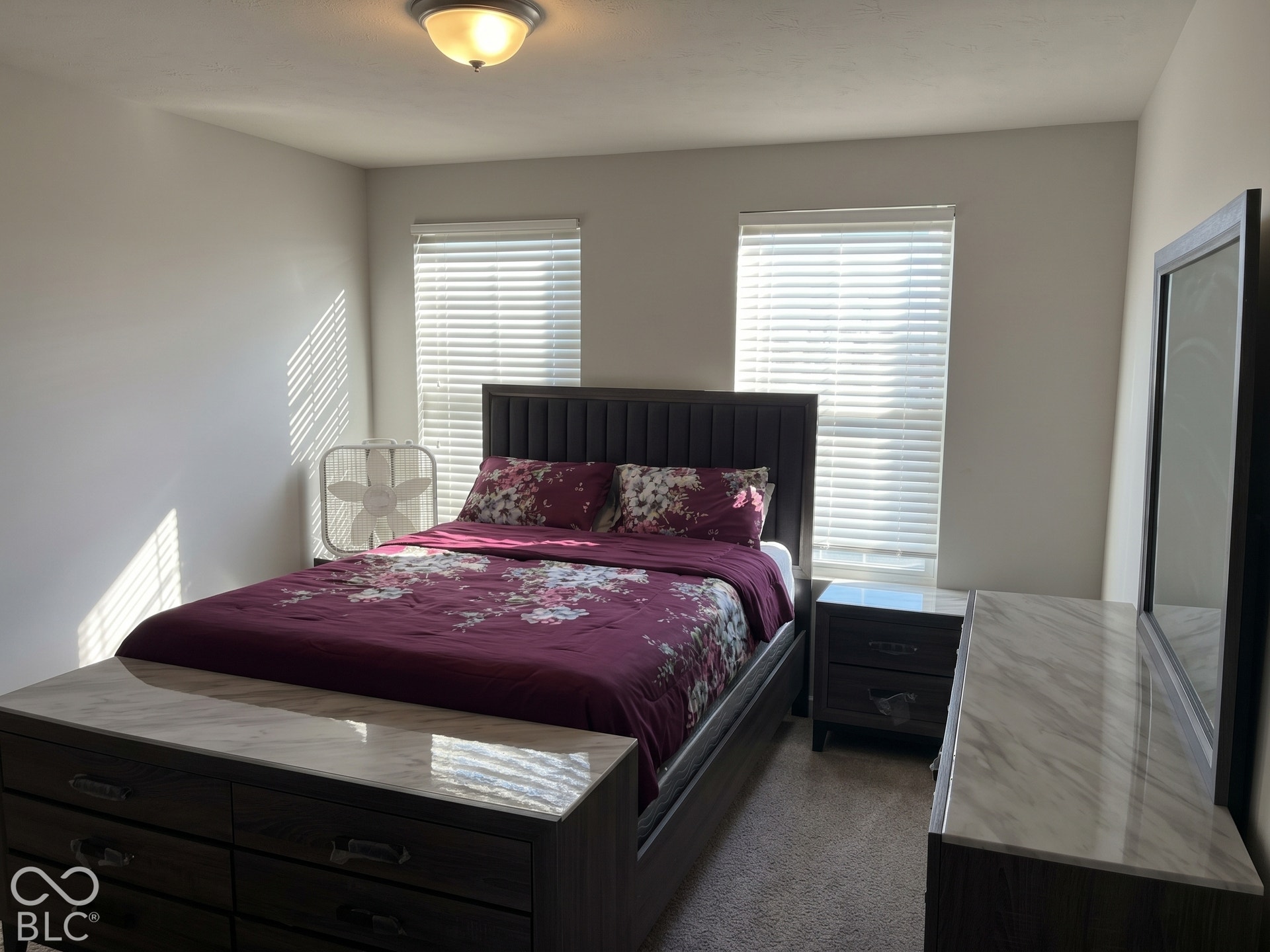 Virtually Altered - Bedroom 2 with recessed lighting fixture, light-colored carpeting, multiple windows with blinds, and light-toned walls