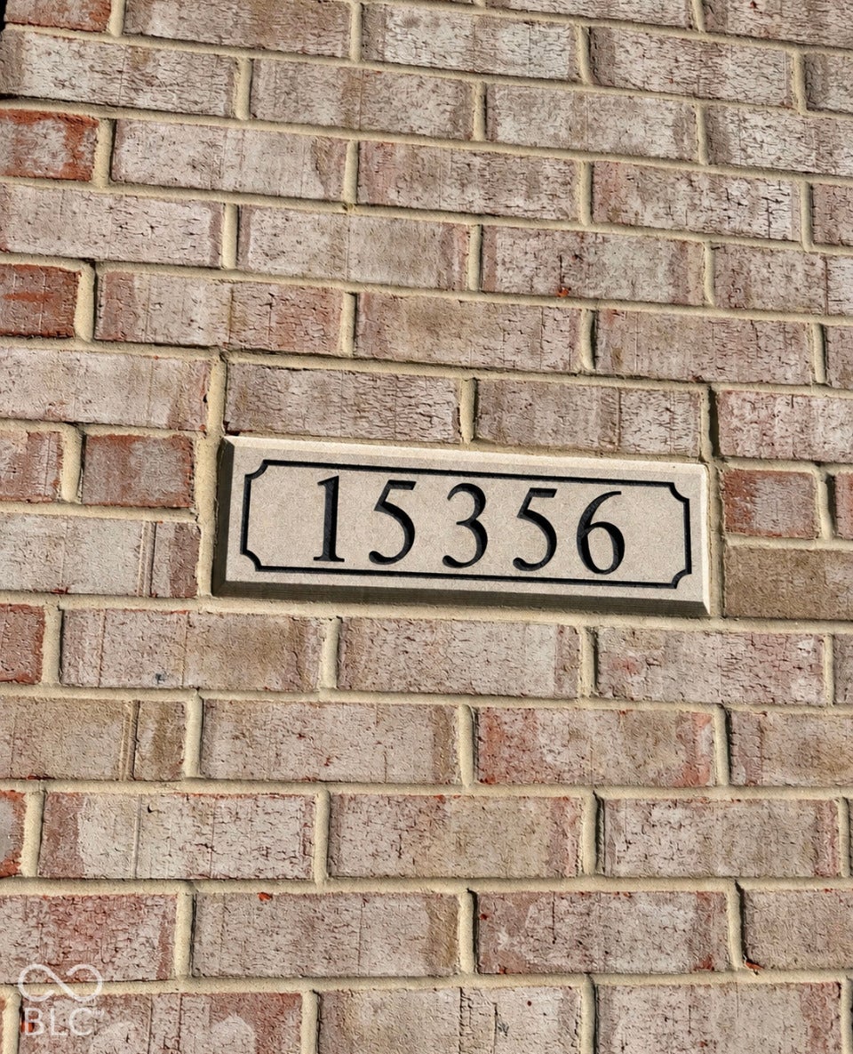 15356 Ackerley Drive, Fishers, IN 46040 Brick exterior with a stone address plaque