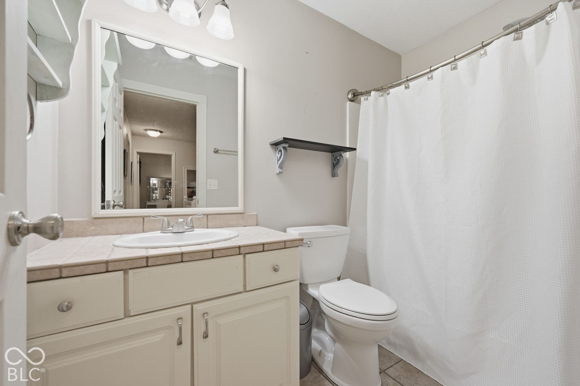 Full Guest Bathroom Features A Shower/Tub Combo