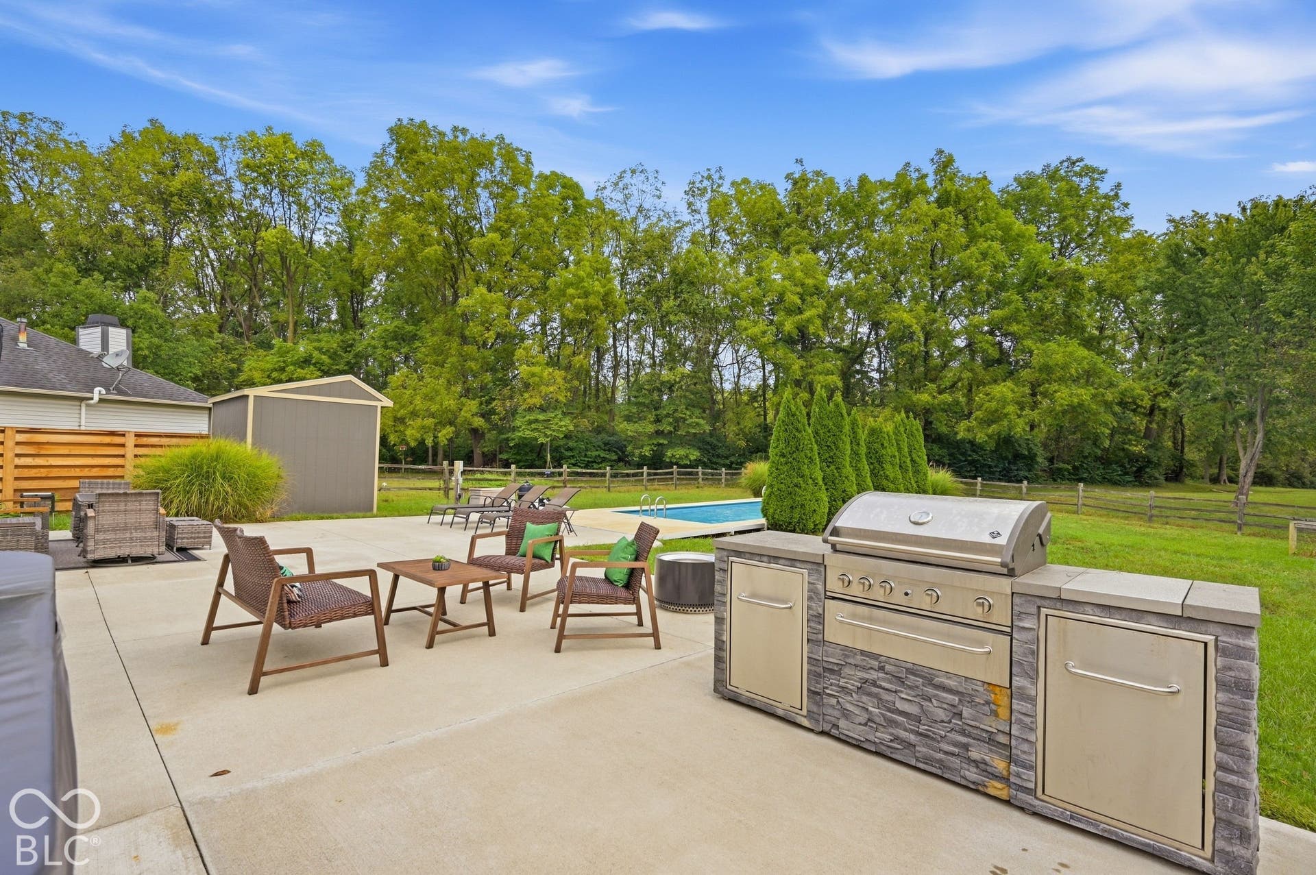 Outdoor Kitchen With Gas Grill & Is Connected To A Gas Line