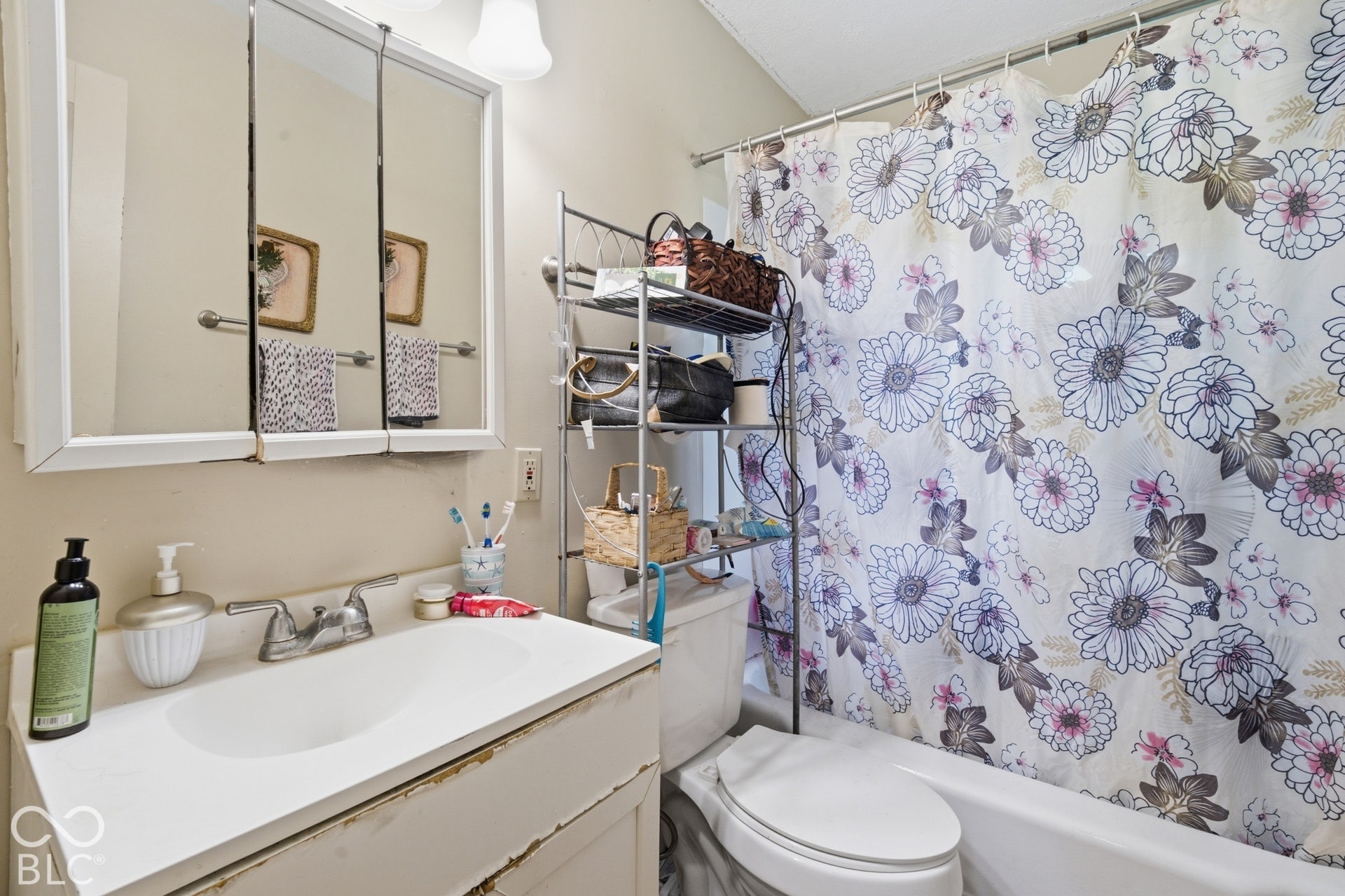 1273 Farley, Indianapolis, IN 46214 White bathroom vanity with integrated sink