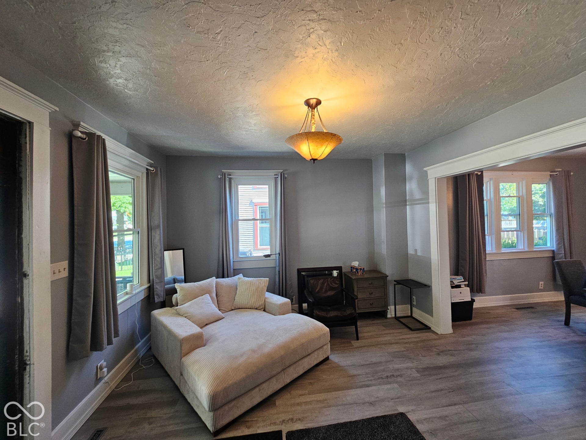 917 W 8th Street, Anderson, IN 46016 Recessed lighting, wood-finish flooring, and a decorative ceiling fixture