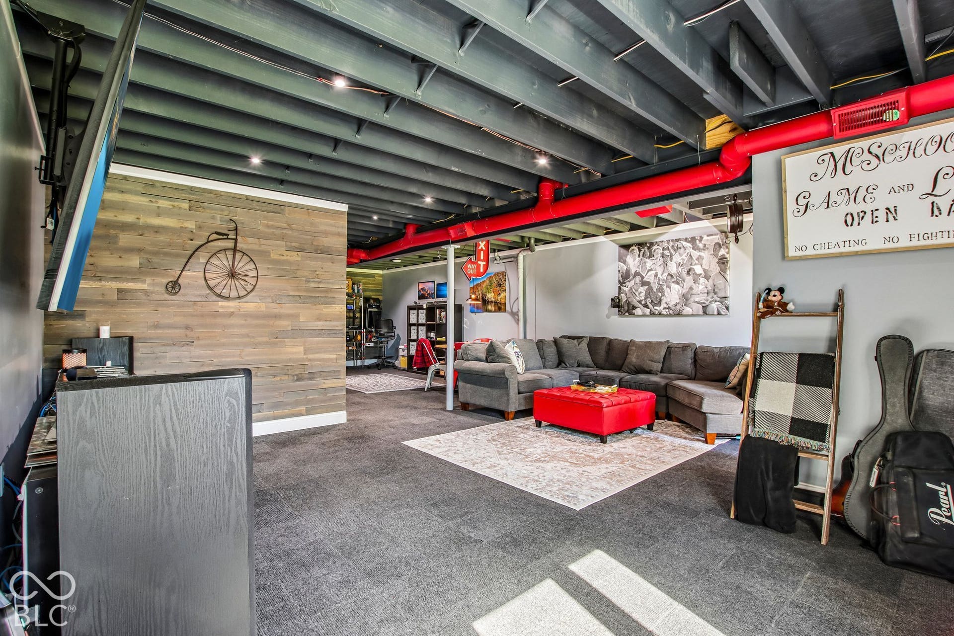 Finished ceiling with exposed red ductwork