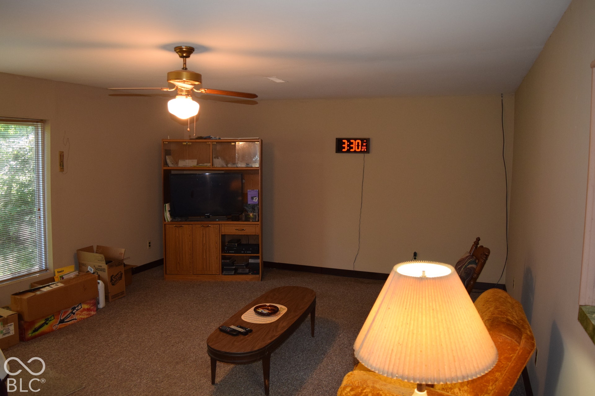 Recessed window featuring horizontal blinds