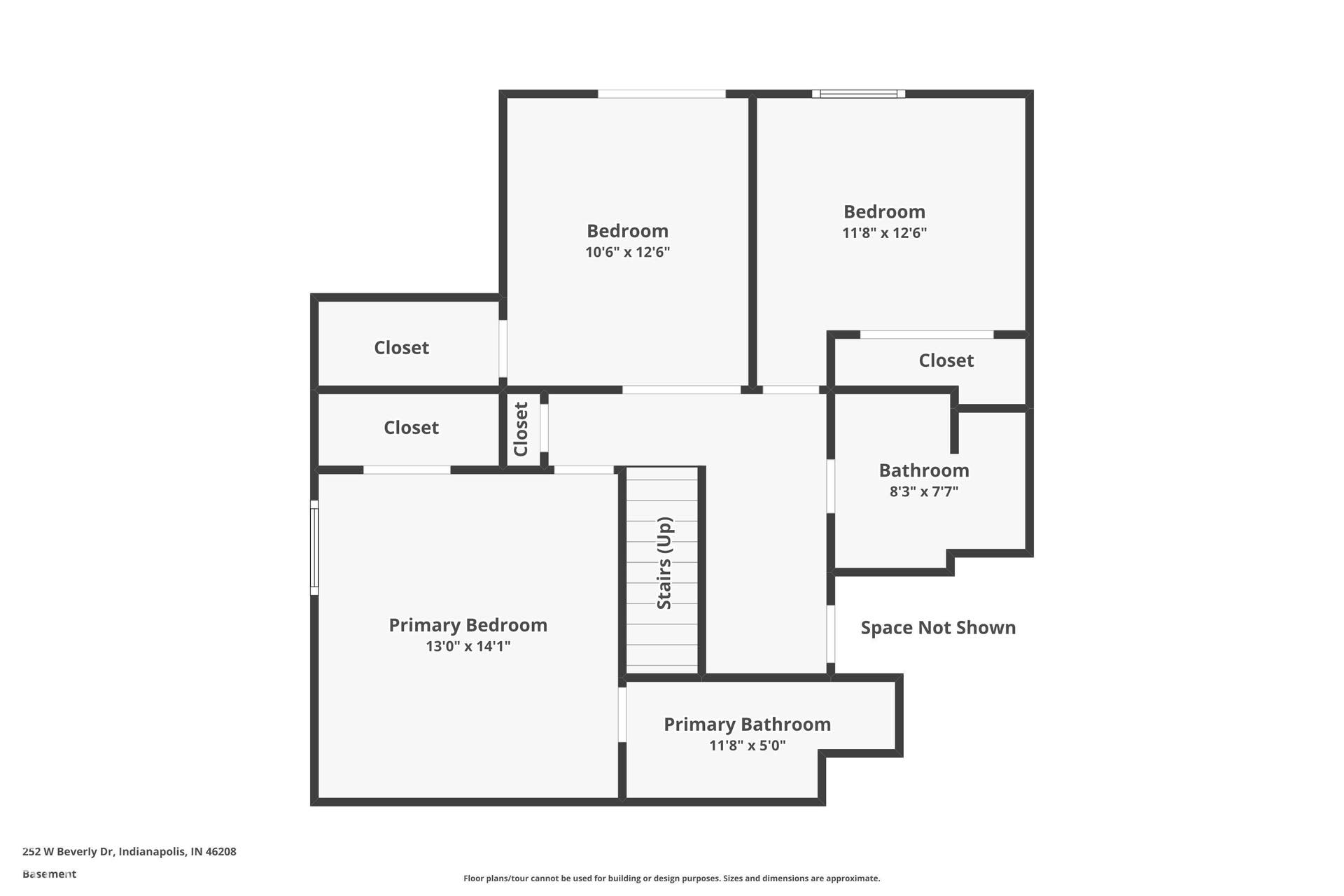 Lower level floor plan: primary bedroom with private bath, two additional bedrooms, a second full bath and the floating staircase. All three bedrooms sit on the walk-out level.