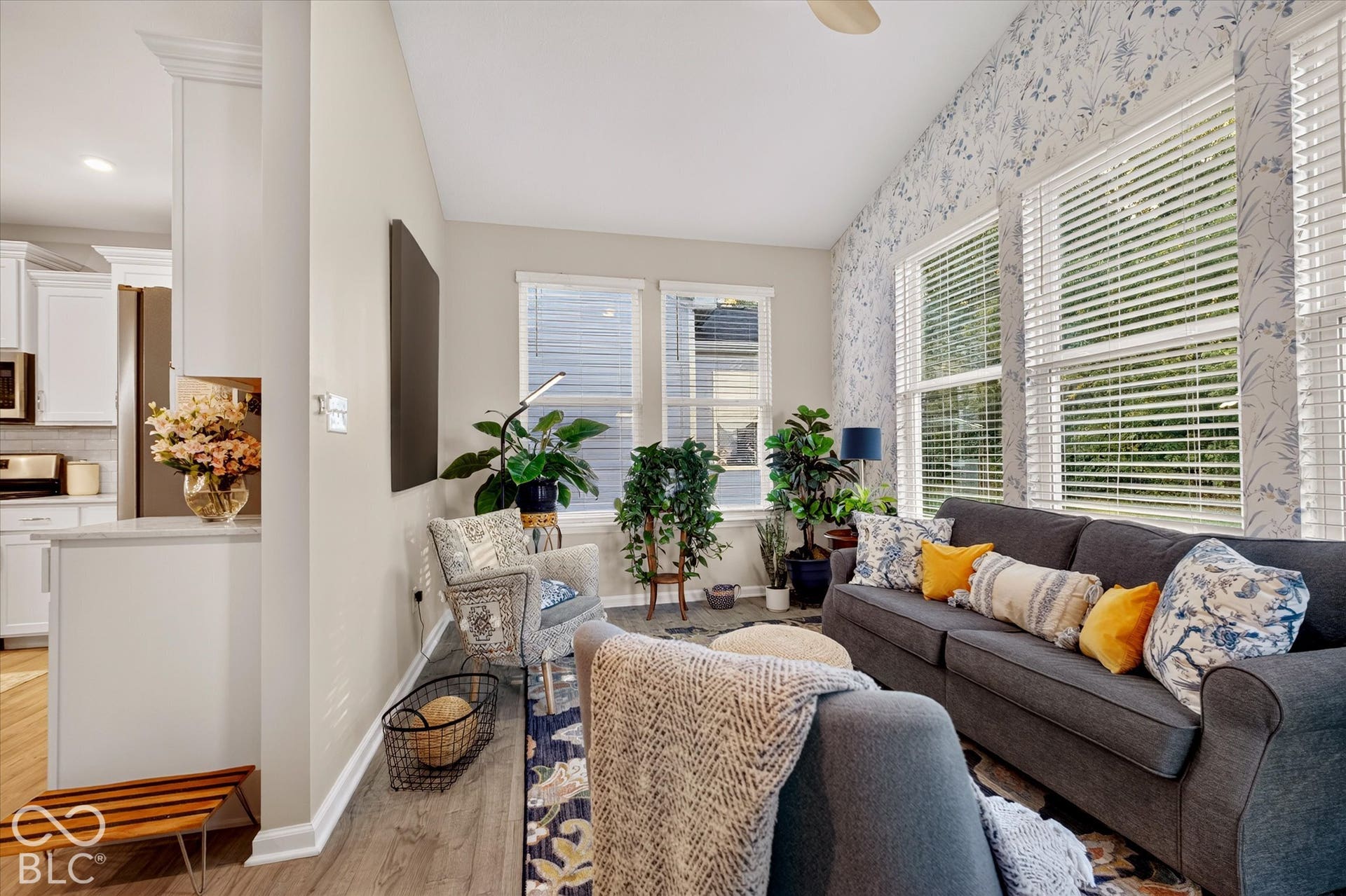 Sun room has cathedral ceiling, and leads to the open patio. Enjoy your morning coffee and do some bird watching.