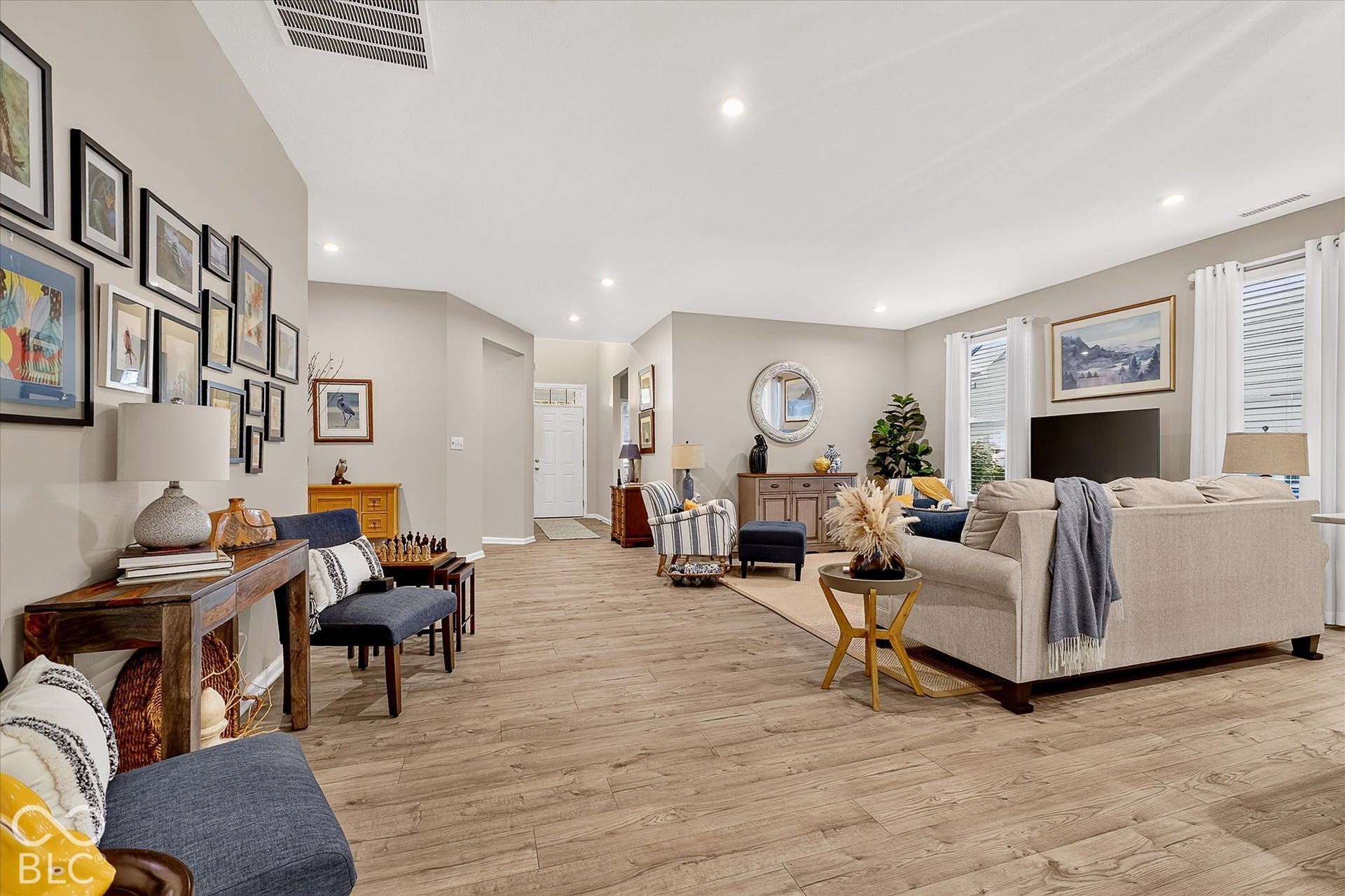 Spacious living features an open concept living space with LVP flooring.