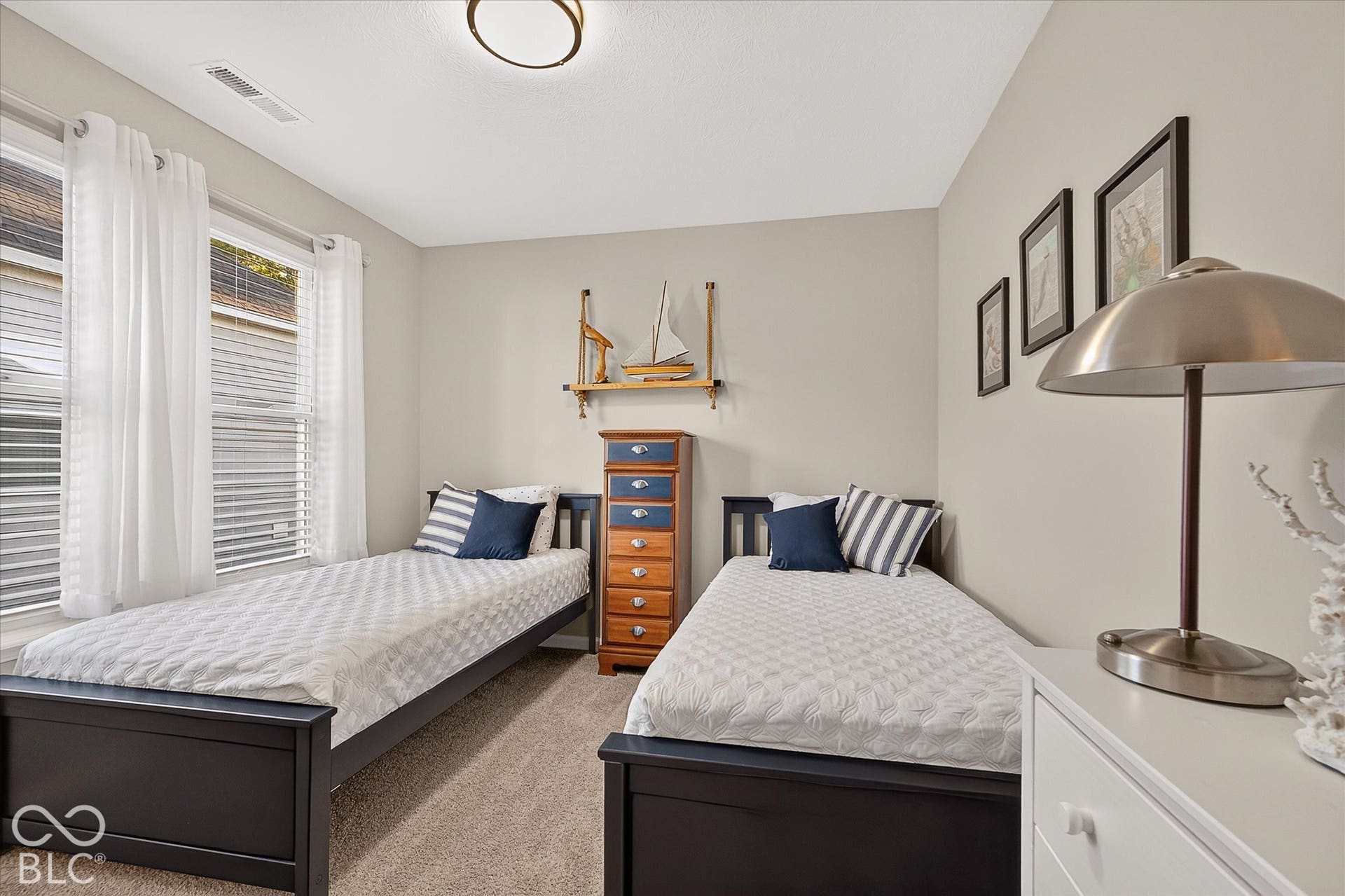 Upstairs bedroom could be a private retreat for guests.