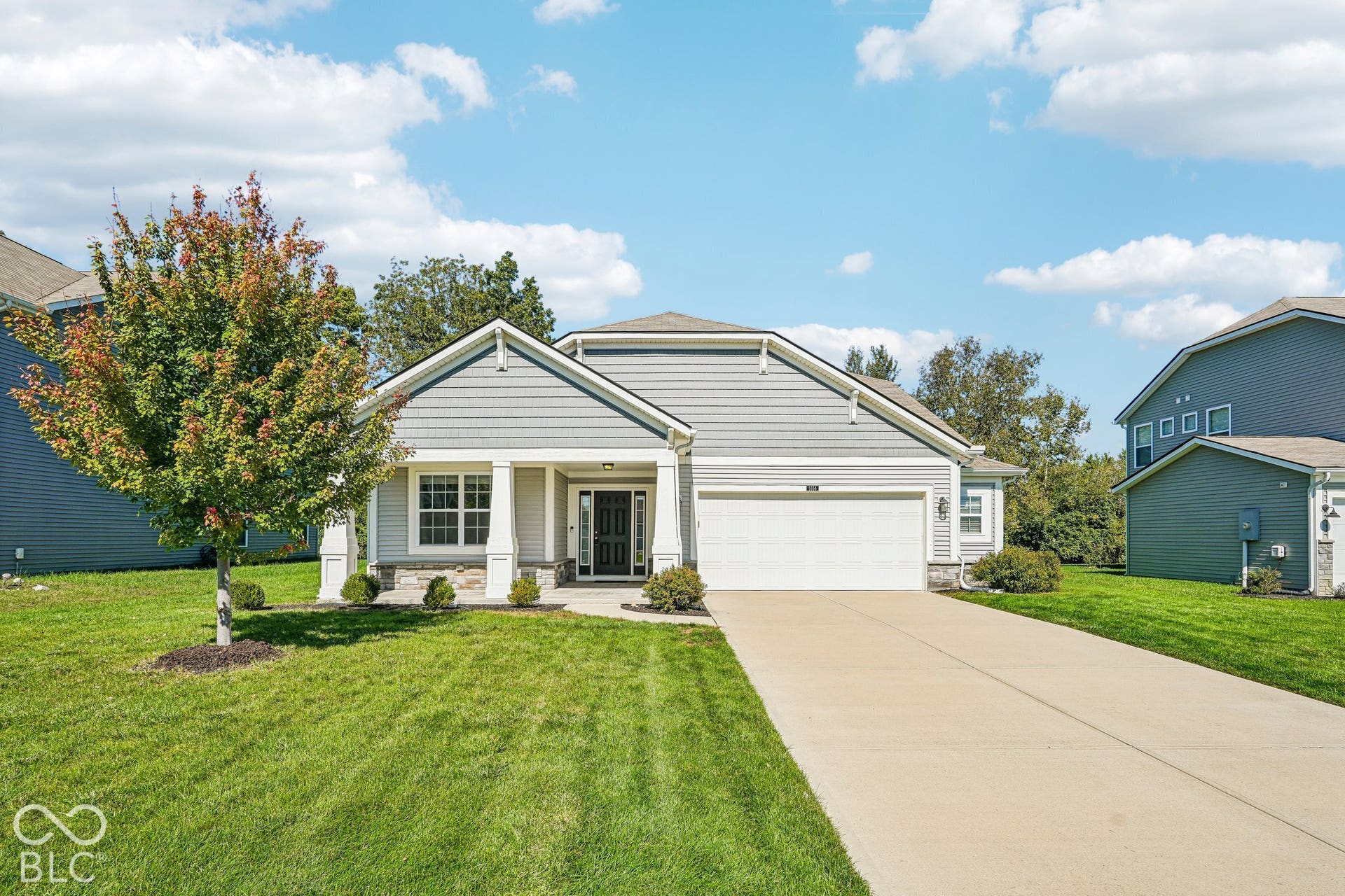 Light gray siding exterior with white trim