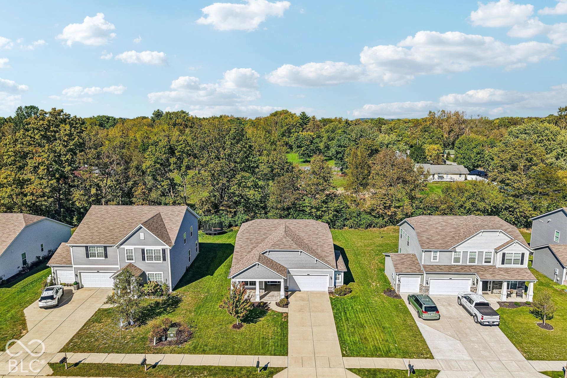 Expansive neighborhood featuring mature trees and established residences