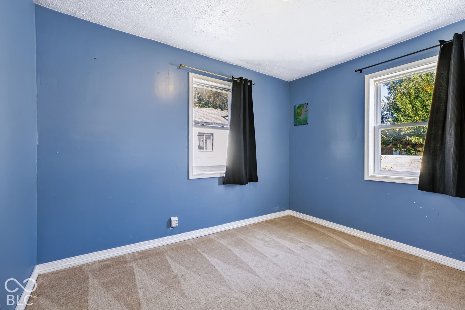 2101 Sharon Avenue, Indianapolis, IN 46222 Carpeted flooring, two windows, and textured ceiling