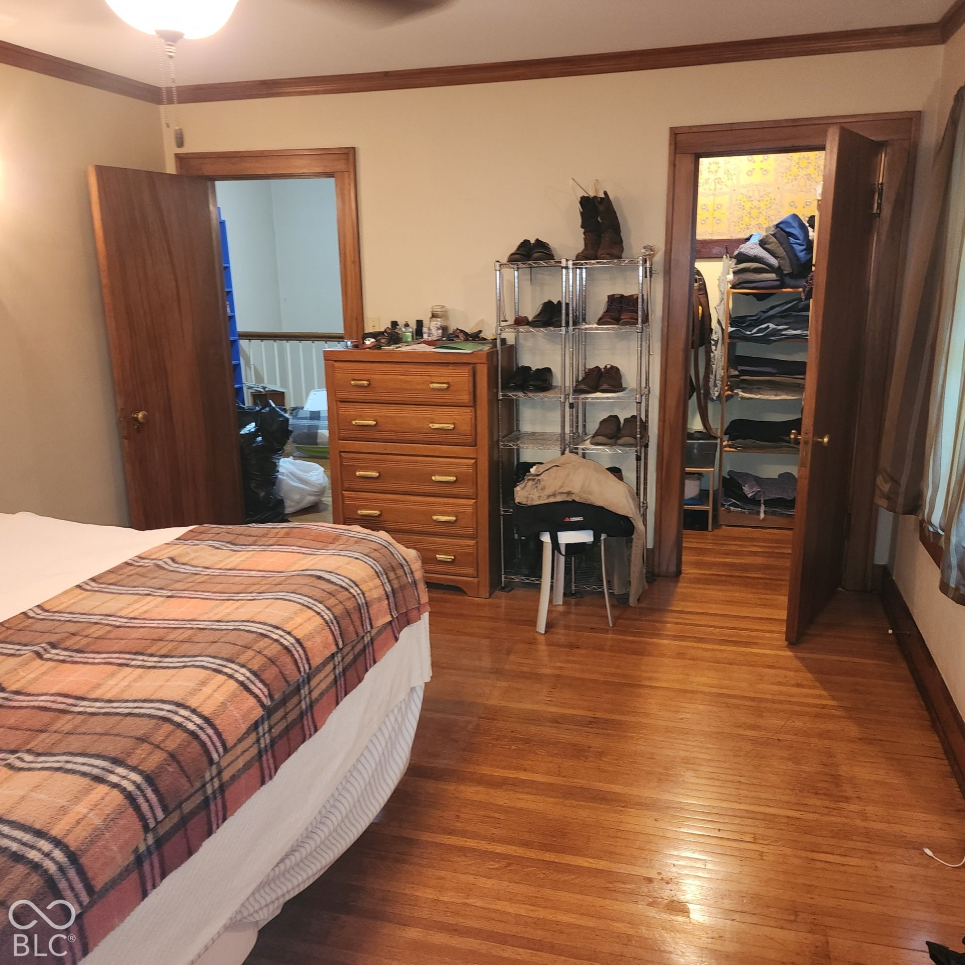 Wood-finish flooring with a flush-mount ceiling light