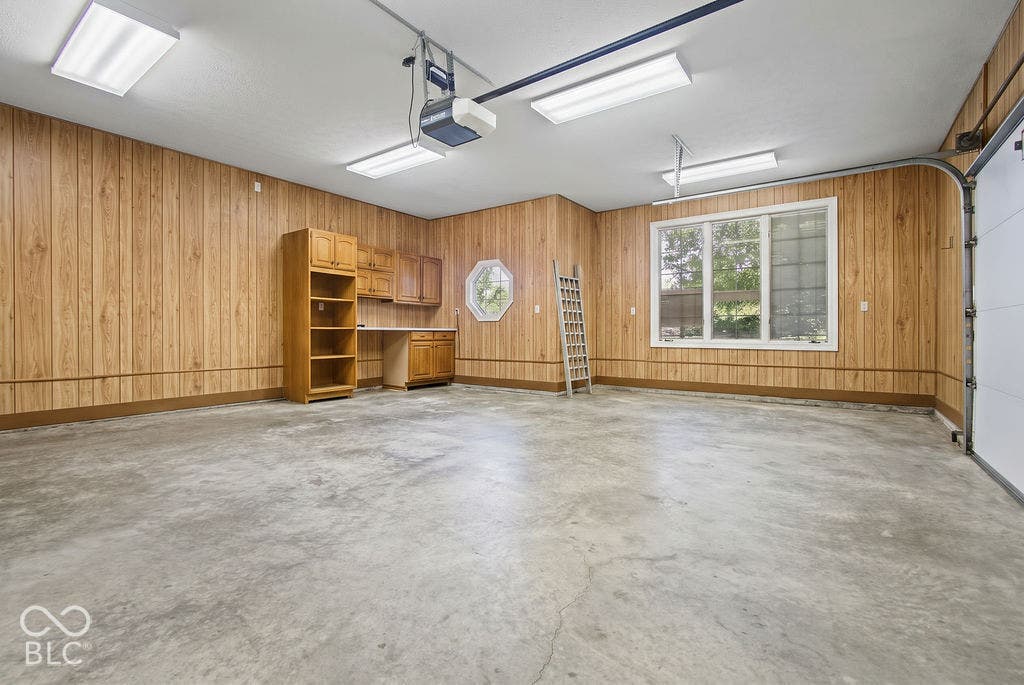Main Level Garage Interior w/Workshop Area