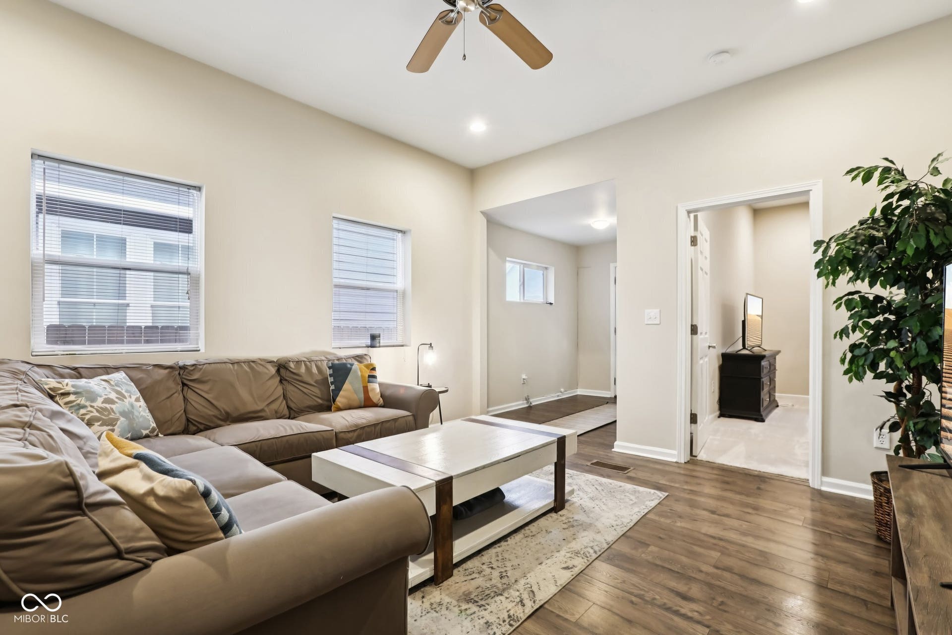729 E Morris Street, Indianapolis, IN 46203 living room featuring ceiling fan, dark wood finished floors, and recessed lighting