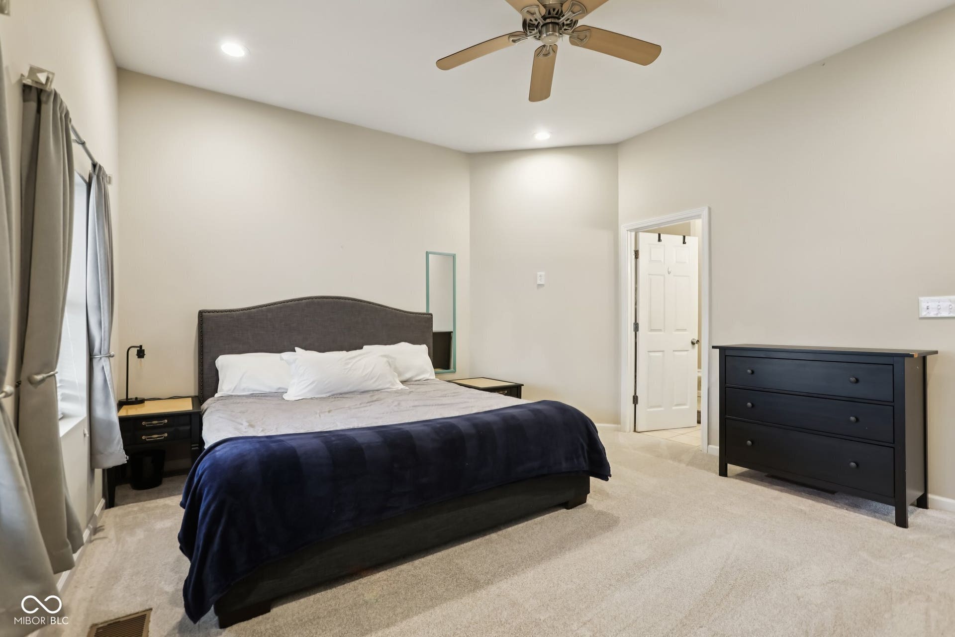 729 E Morris Street, Indianapolis, IN 46203 bedroom featuring light carpet, recessed lighting, and a ceiling fan