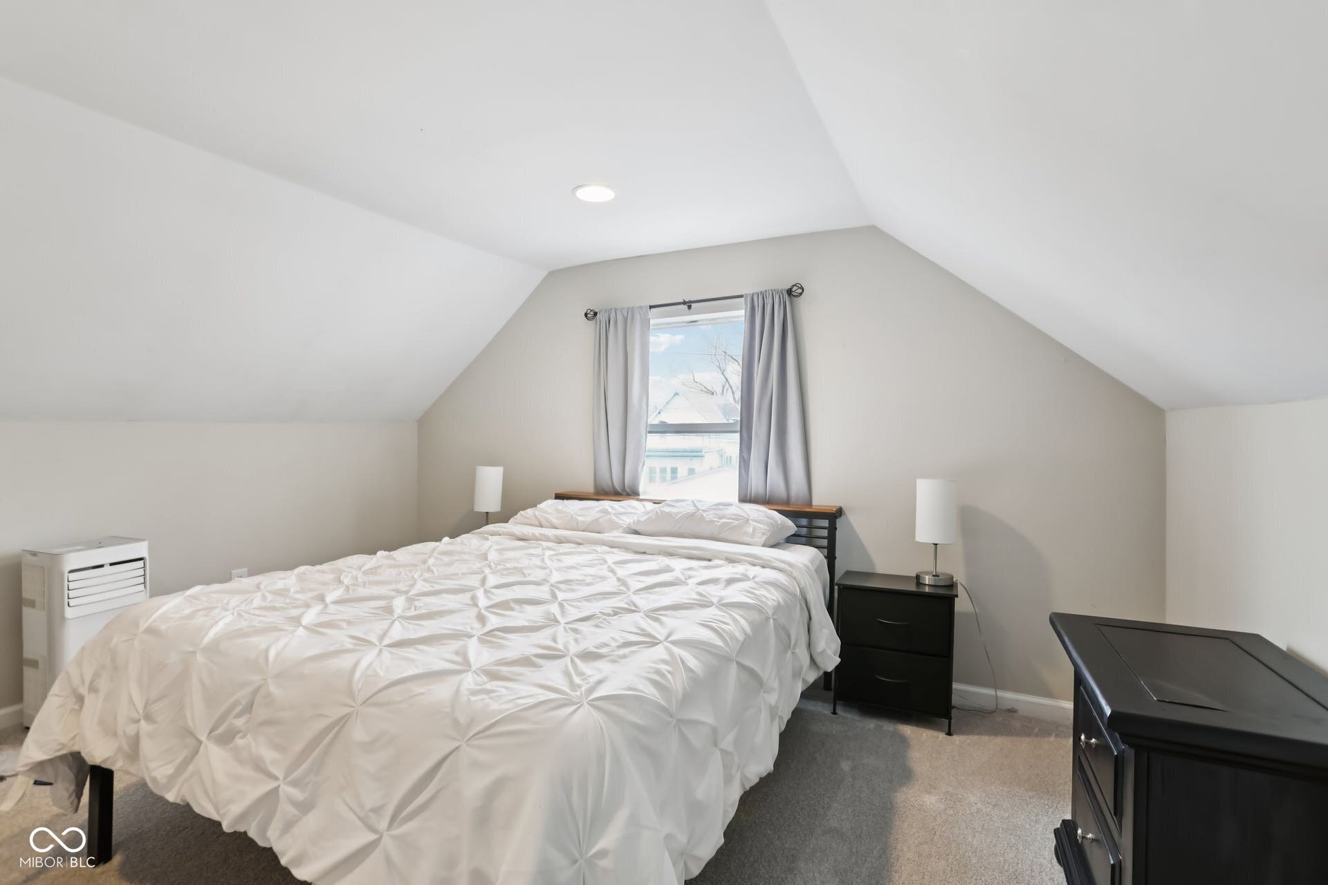 729 E Morris Street, Indianapolis, IN 46203 bedroom with baseboards and carpet