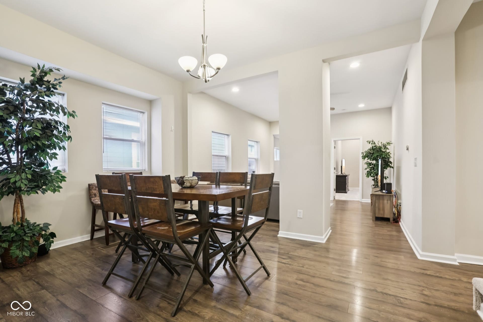 729 E Morris Street, Indianapolis, IN 46203 dining area with hanging lights and dark wood-style flooring