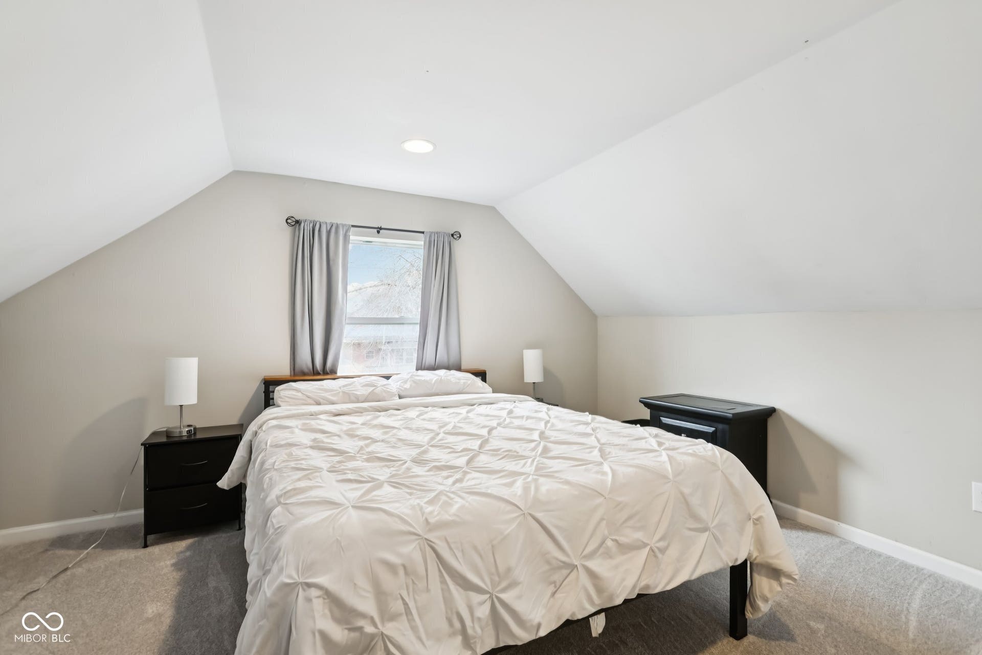 729 E Morris Street, Indianapolis, IN 46203 bedroom featuring baseboards and carpet flooring