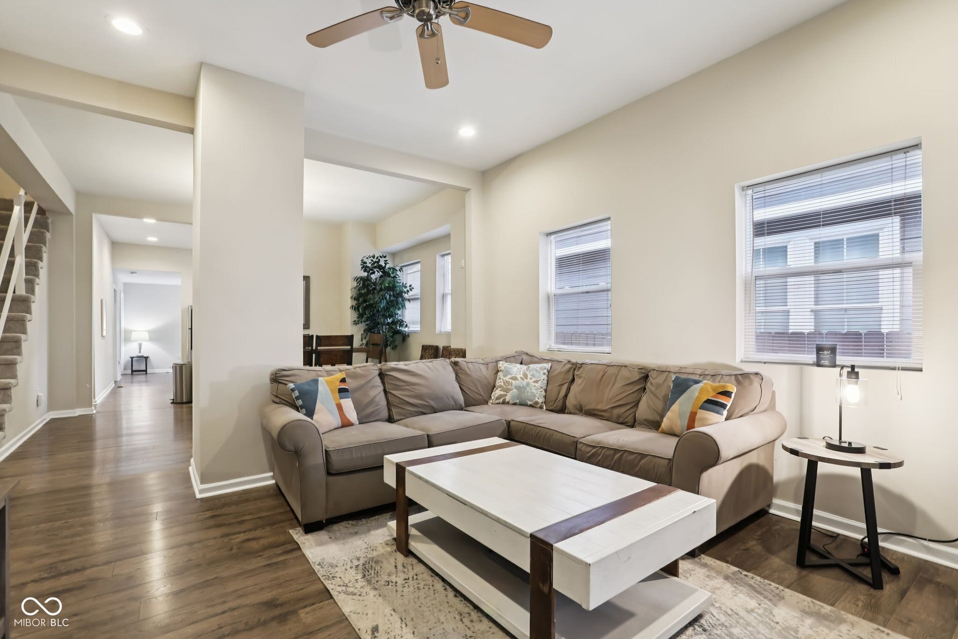 729 E Morris Street, Indianapolis, IN 46203 living area featuring a ceiling fan, wood finished floors, and recessed lighting