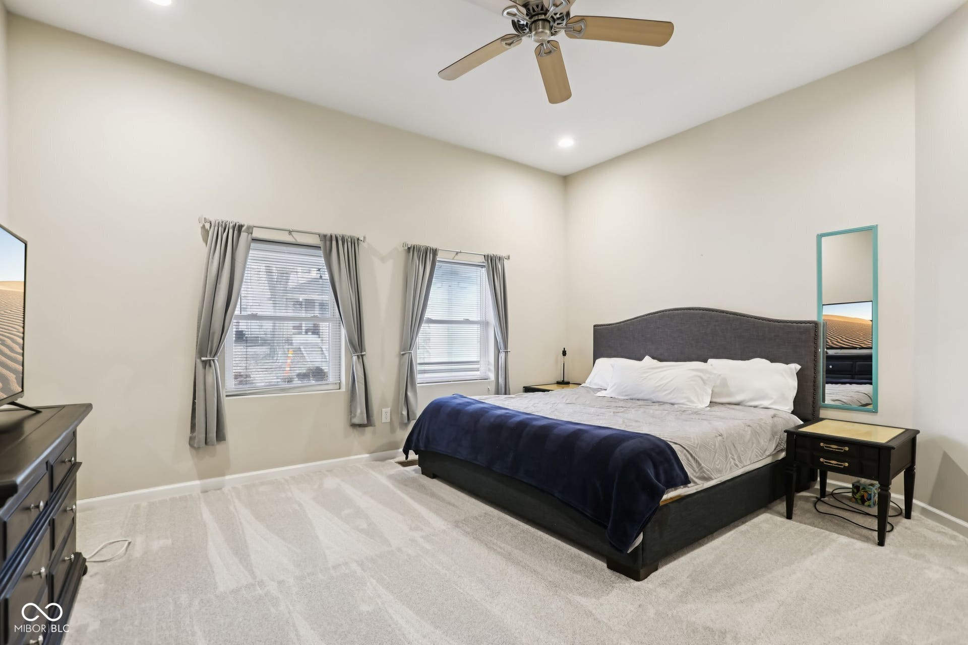 729 E Morris Street, Indianapolis, IN 46203 bedroom featuring light carpet, a ceiling fan, and recessed lighting