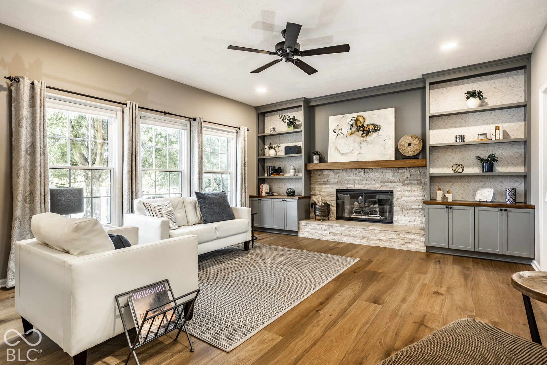 Wood-finish flooring, recessed lighting, and a ceiling fan