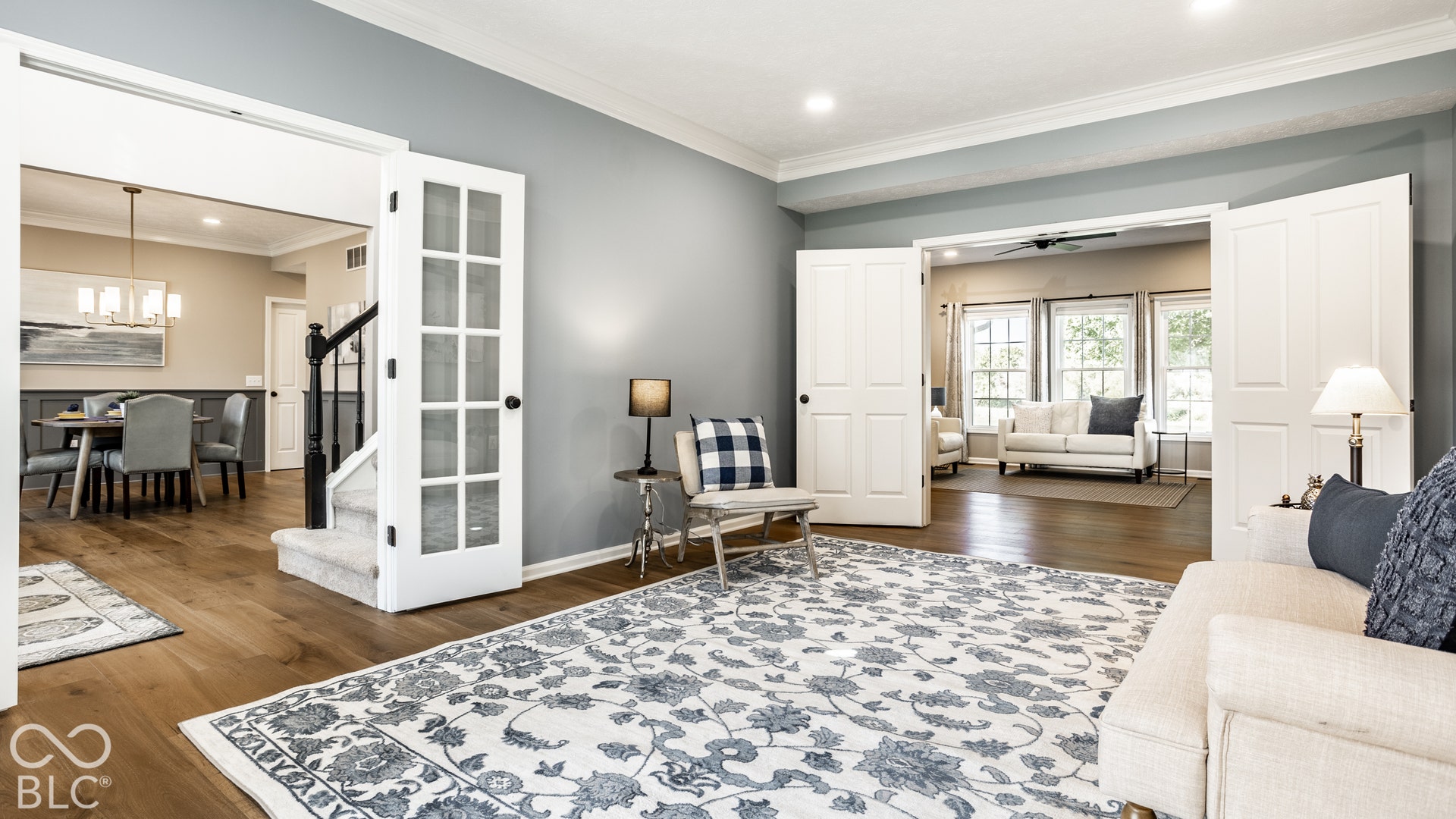 Wood-finish flooring throughout, French doors, recessed lighting, crown molding