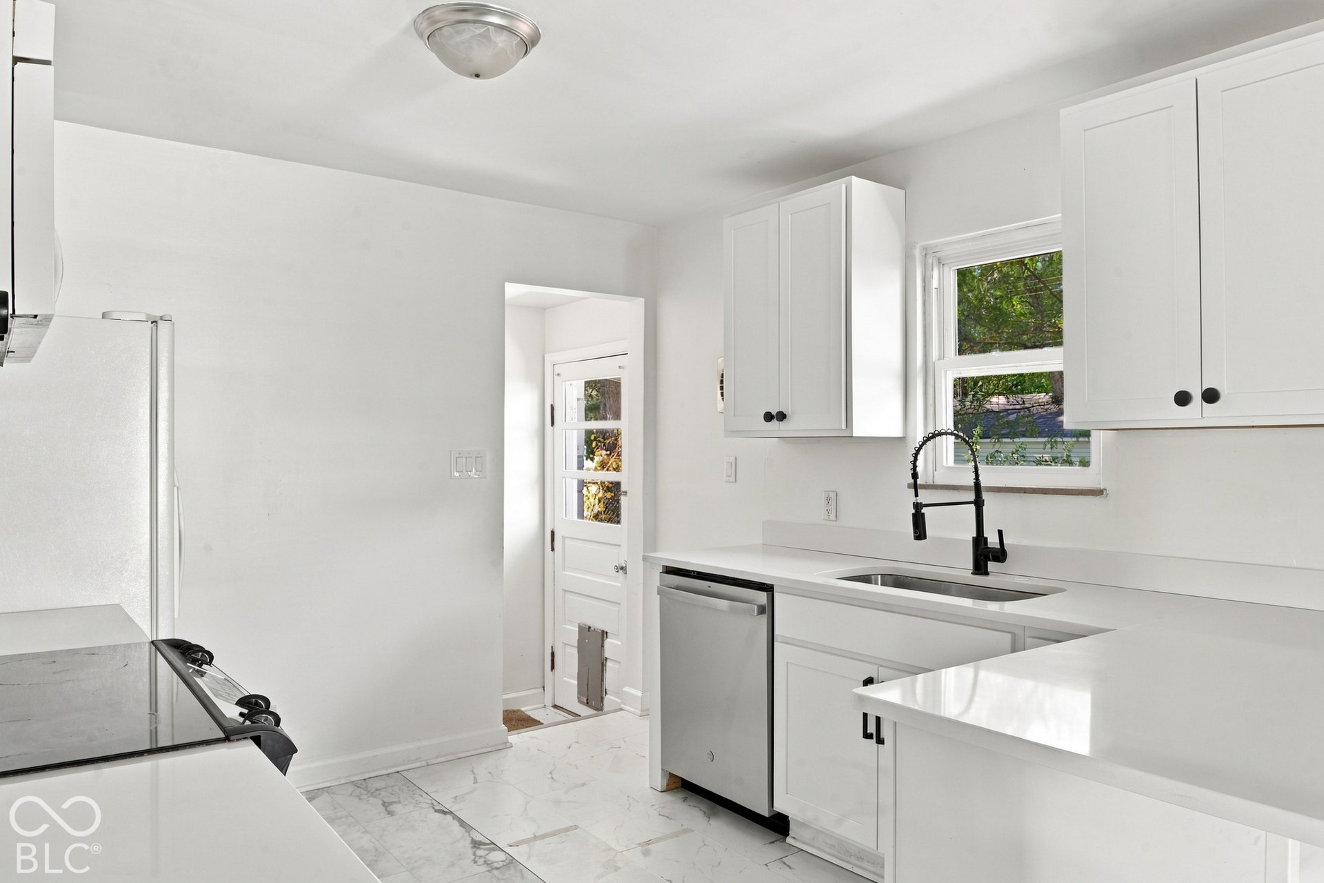 White cabinetry with contrasting black hardware