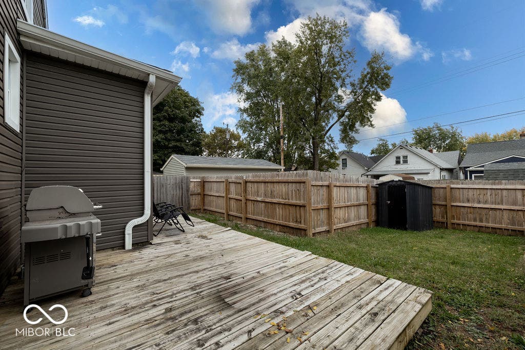 601 Cottage Avenue, Indianapolis, IN 46203 wooden terrace with a fenced backyard and grilling area