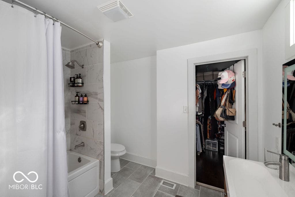 601 Cottage Avenue, Indianapolis, IN 46203 Main | full bathroom featuring shower / tub combo, and a walk in closet