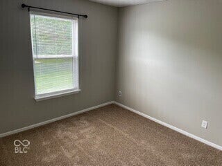 Neutral tone wall paint with a single window featuring blinds