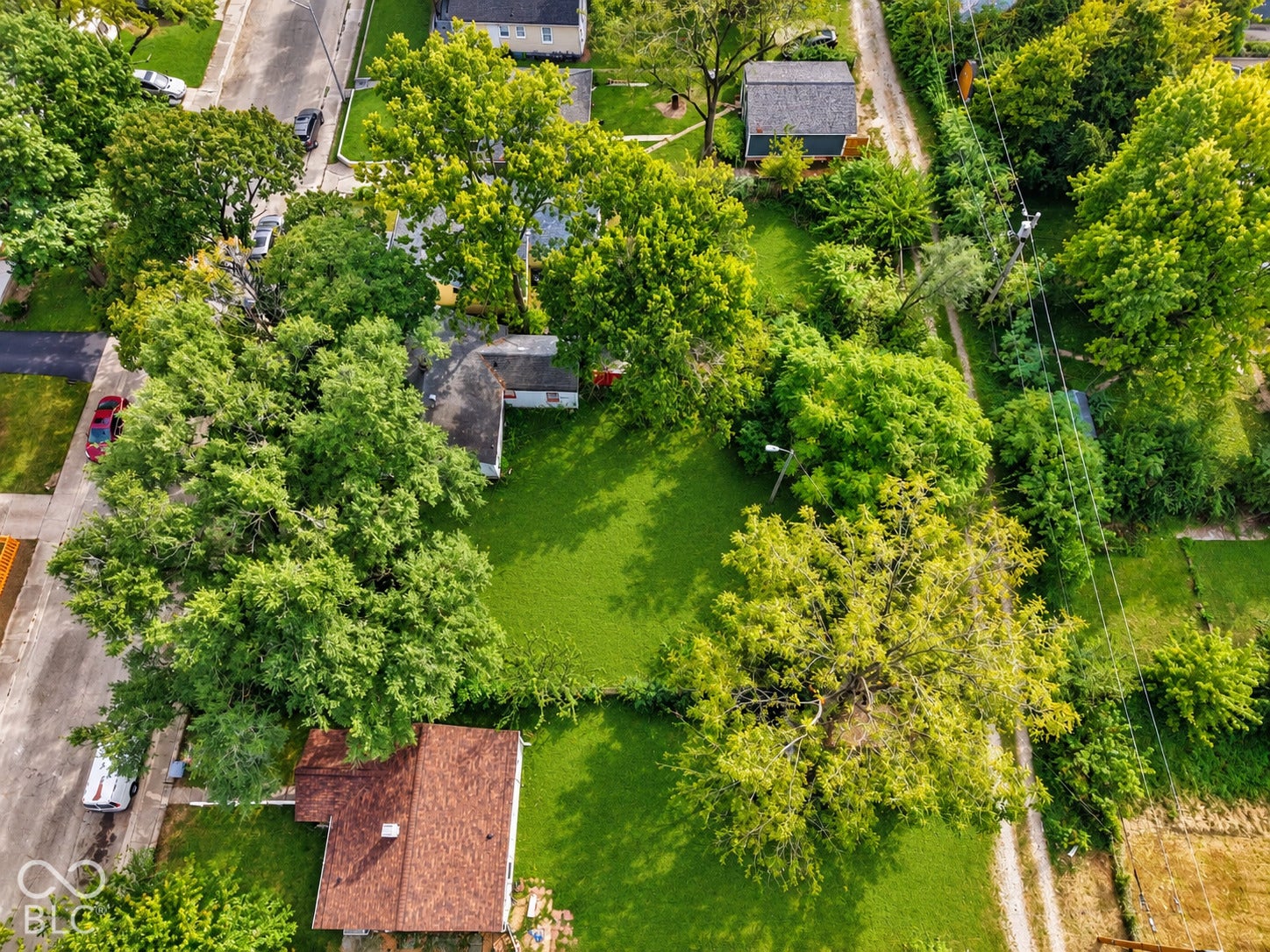 Expansive lot with lush green lawn