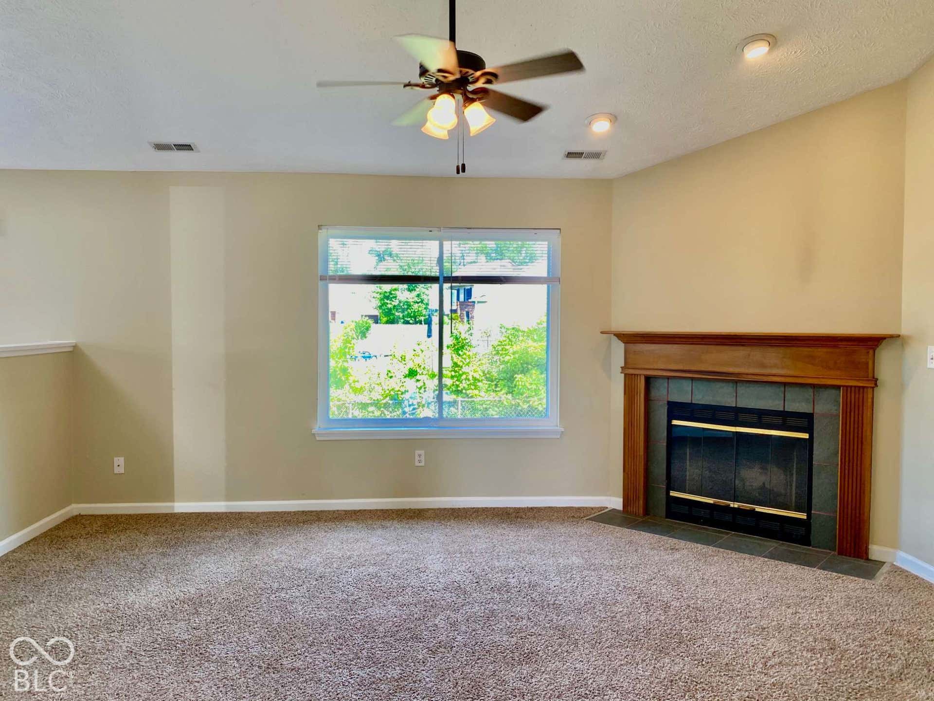 3911 Bonn Drive, Indianapolis, IN 46228 Vaulted ceiling with recessed lighting and a ceiling fan