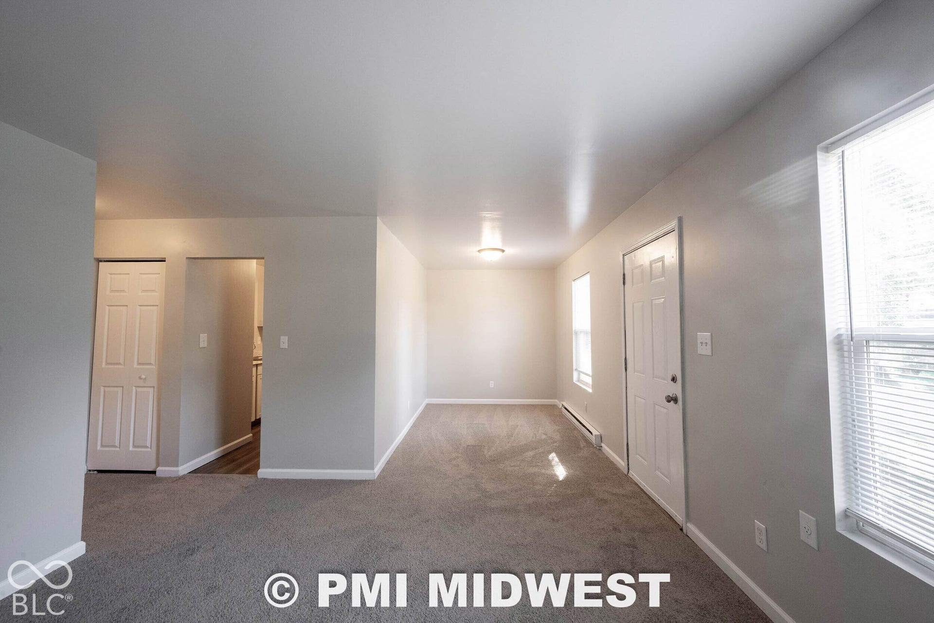 1122 Congress Avenue, Indianapolis, IN 46208 Neutral wall colors, recessed lighting, and carpeted flooring