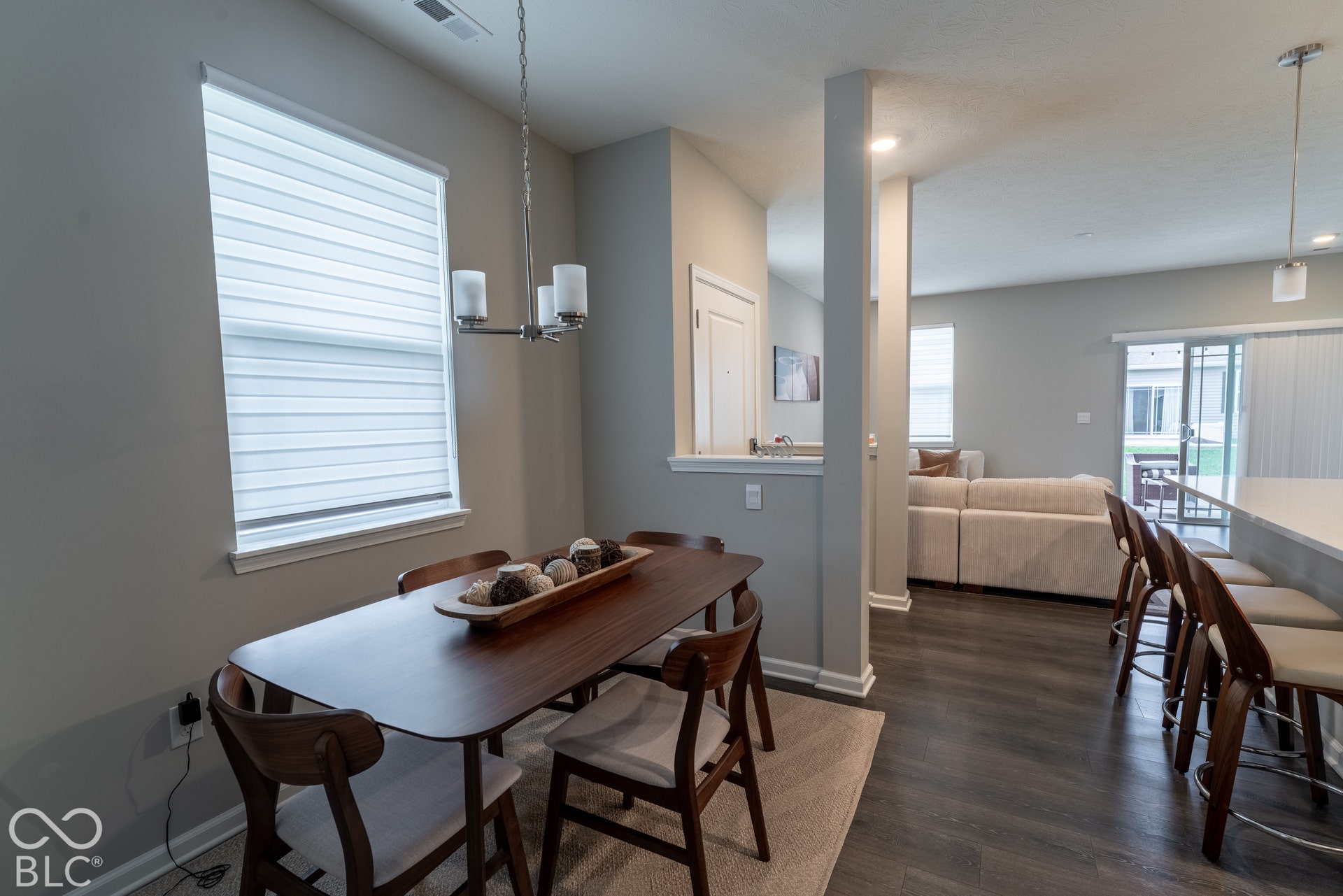 6432 Yuma, Whitestown, IN 46075 Recessed lighting, wood-finish flooring, sliding glass door, and a multi-person dining counter